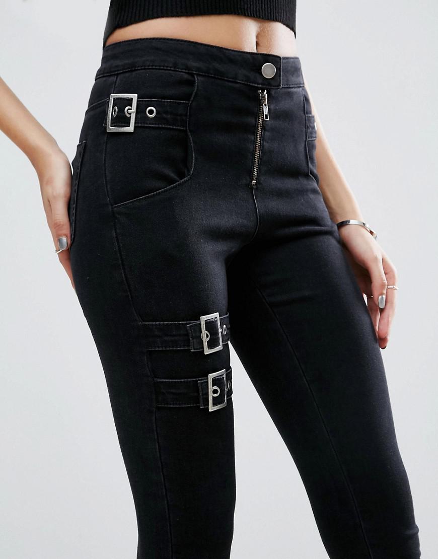 black jeans with buckles