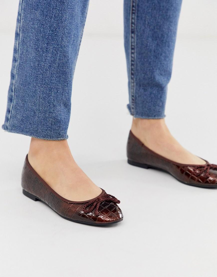 brown flats with bow