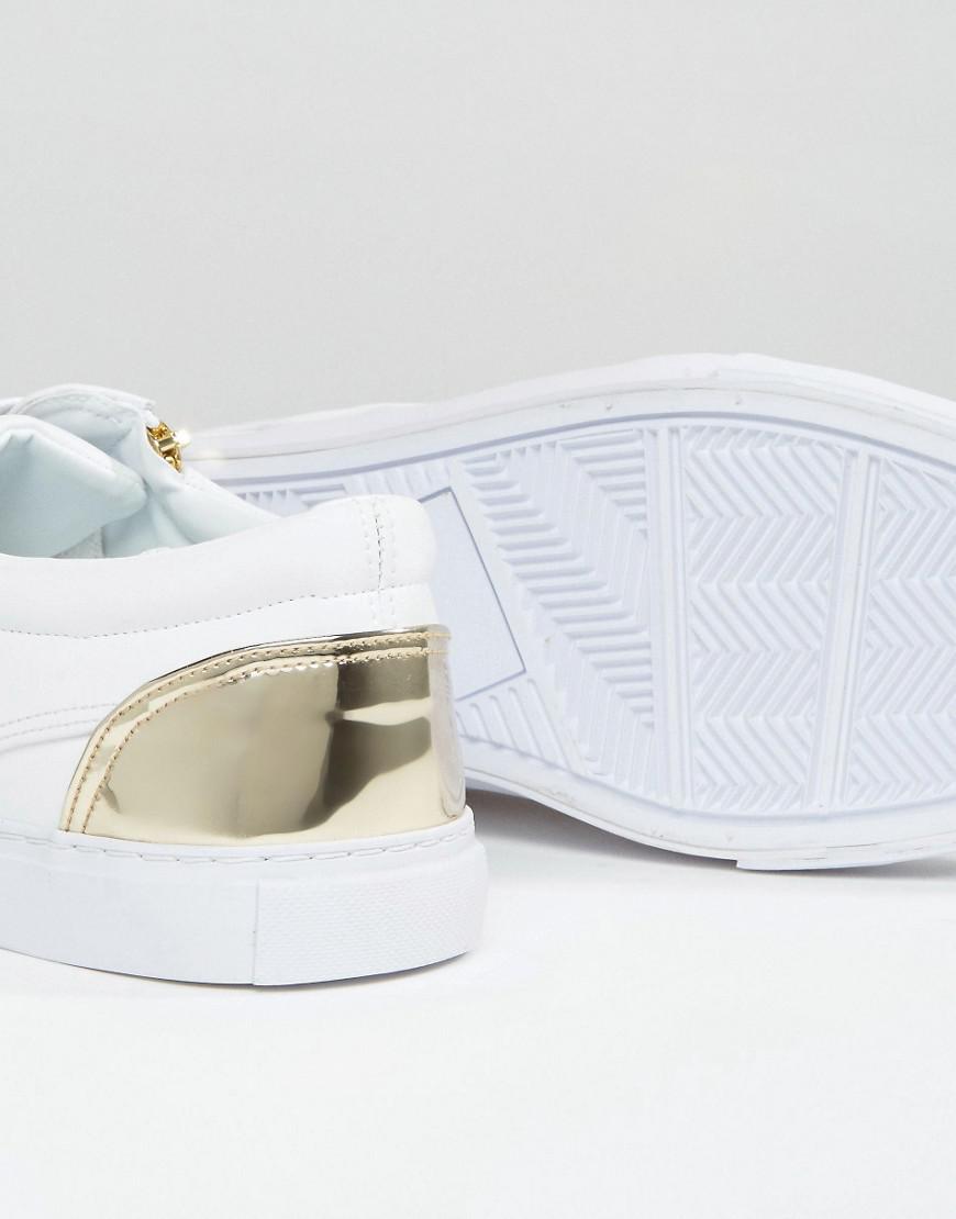 Sneakers In White With Gold Zip
