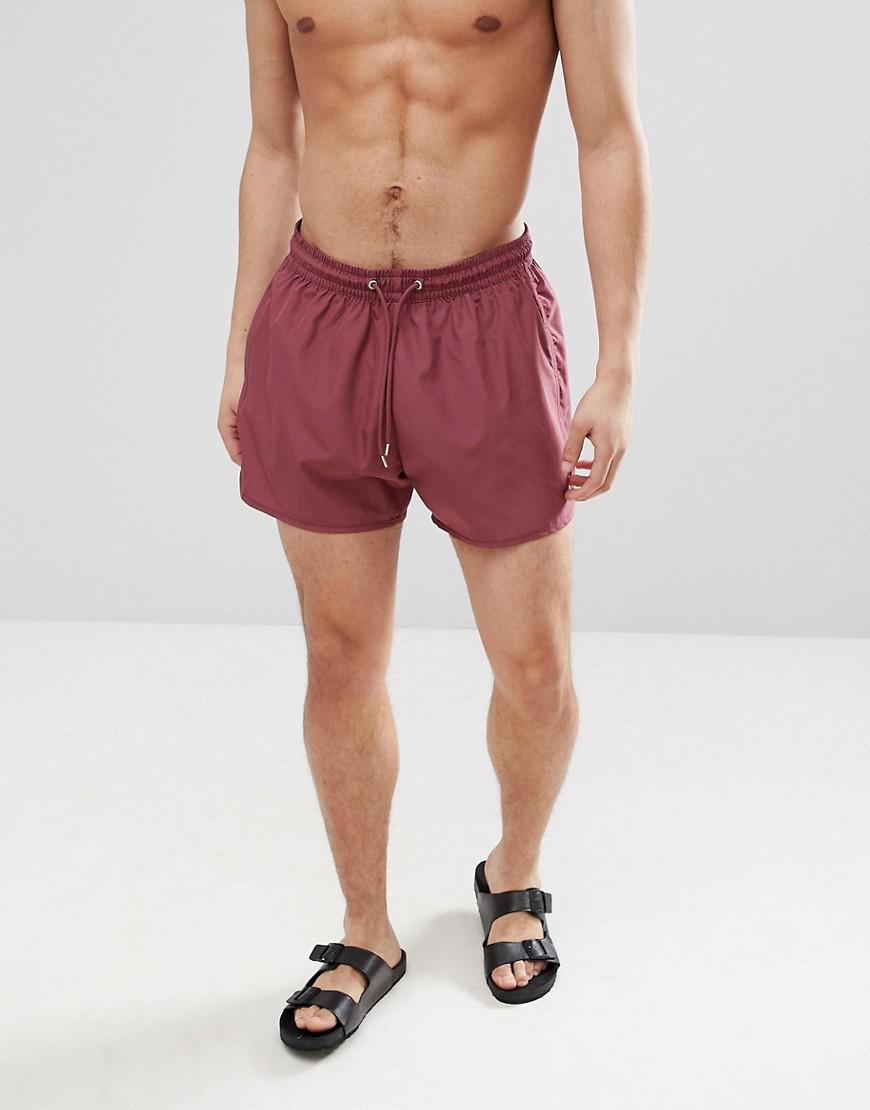 tan swim shorts