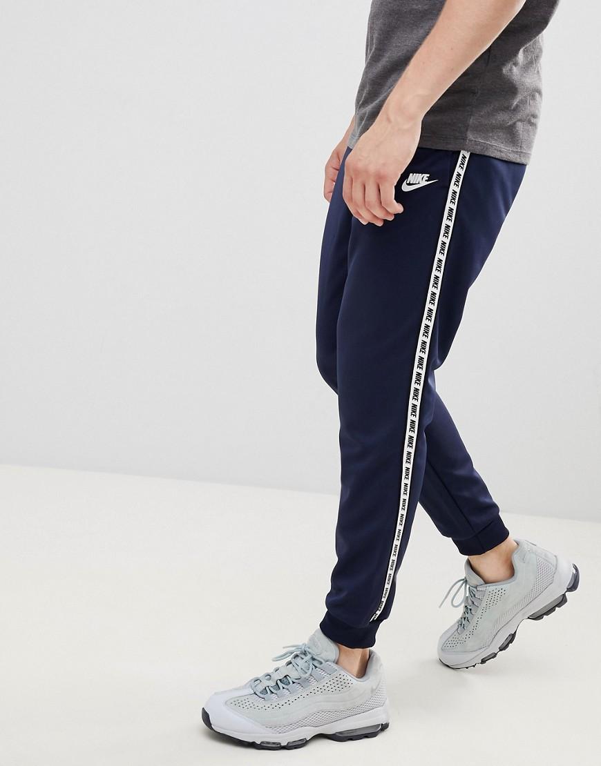 Pantalon de jogging ajusté avec bande - Bleu marine AR4912-451 Nike pour  homme en coloris Bleu - Lyst