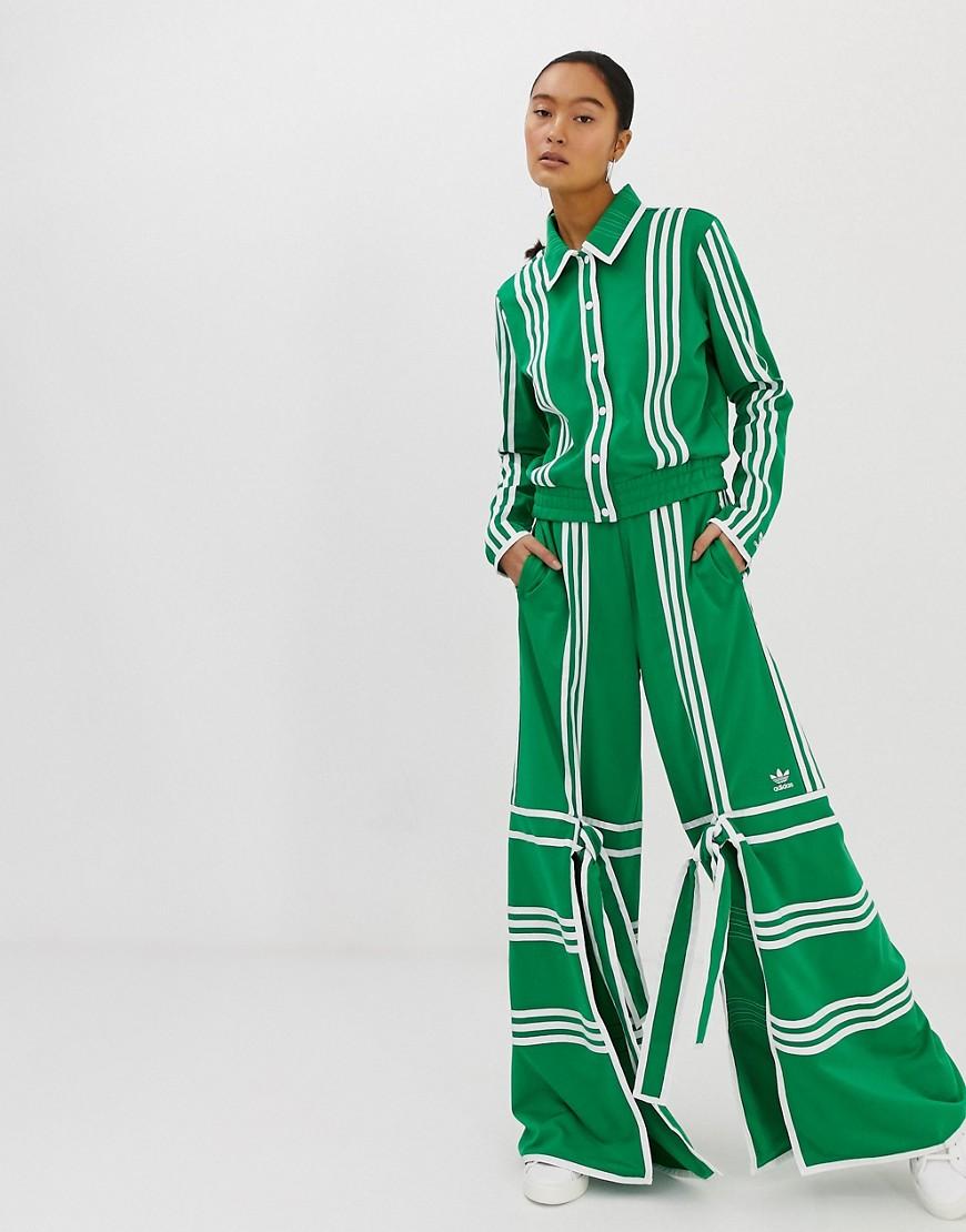 Pantaloni sportivi verdi con spacco sul davantiadidas Originals in  Materiale sintetico di colore Verde | Lyst