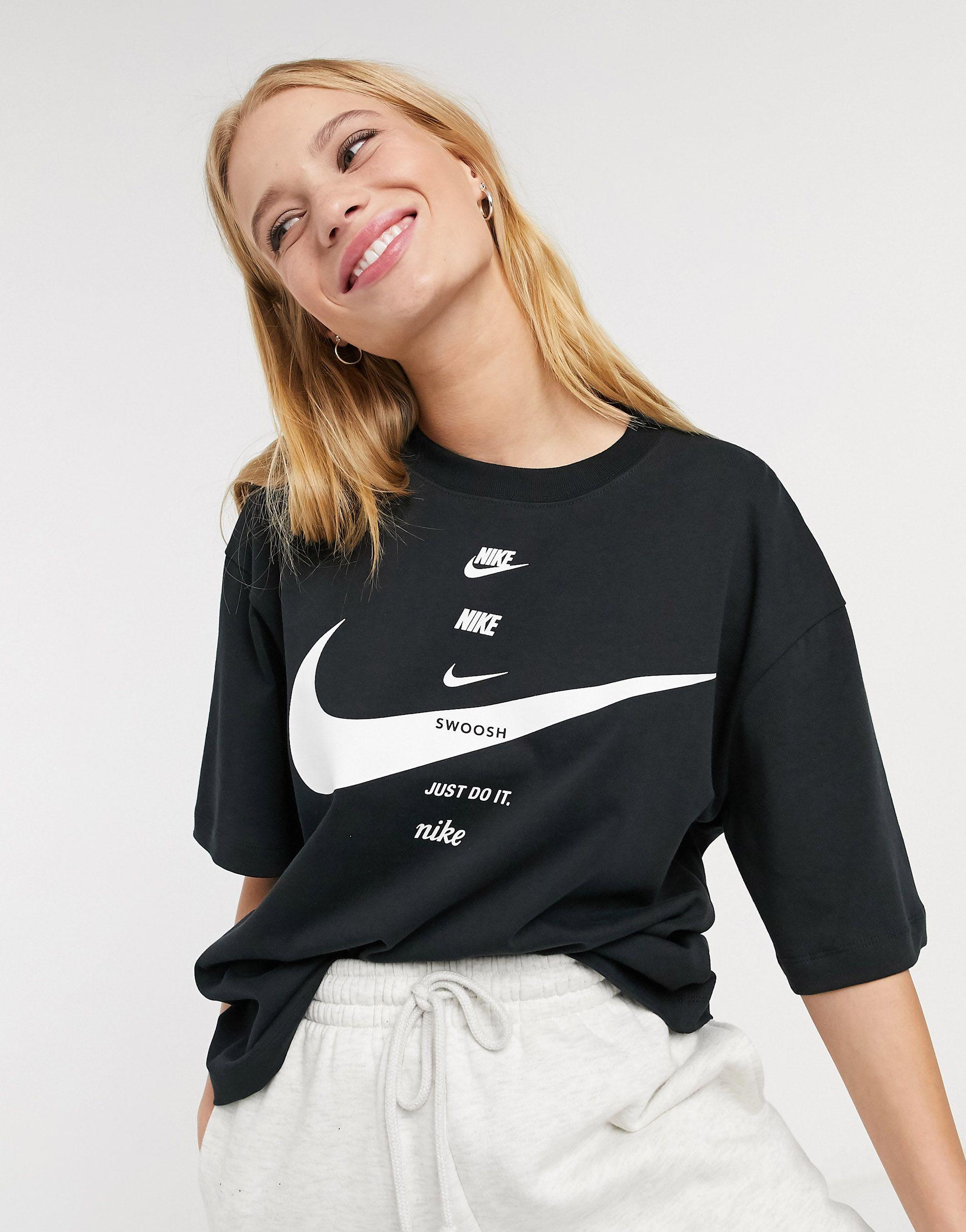 Nike – boyfriend-t-shirt mit swoosh-logos in Schwarz | Lyst DE