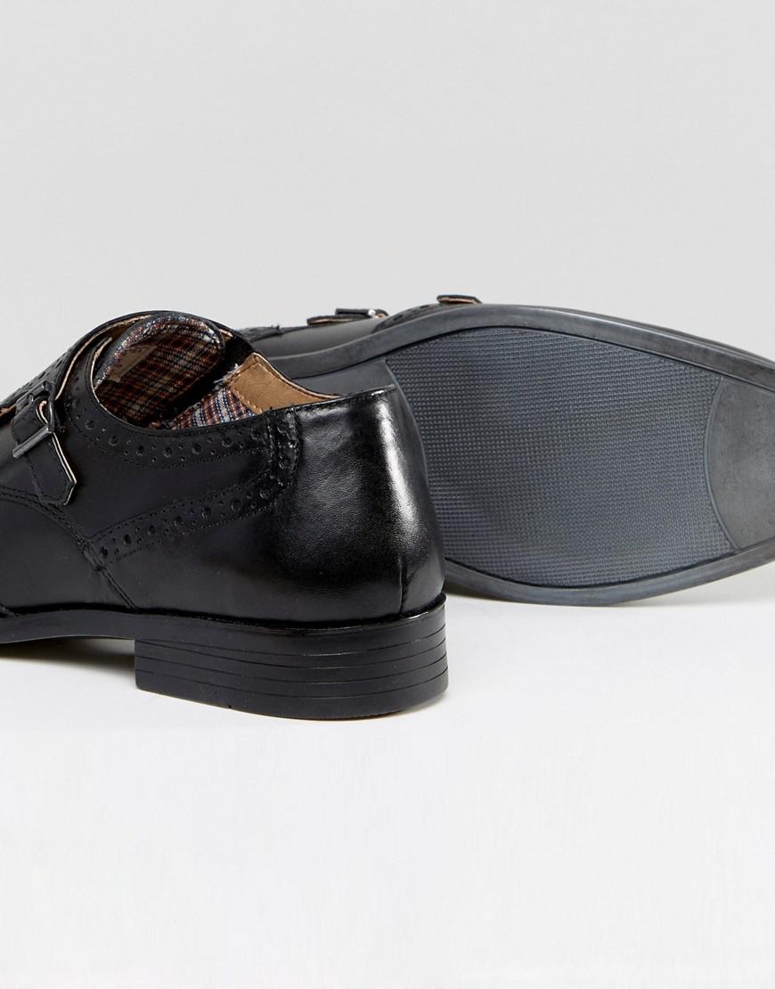 red tape monk shoes in black