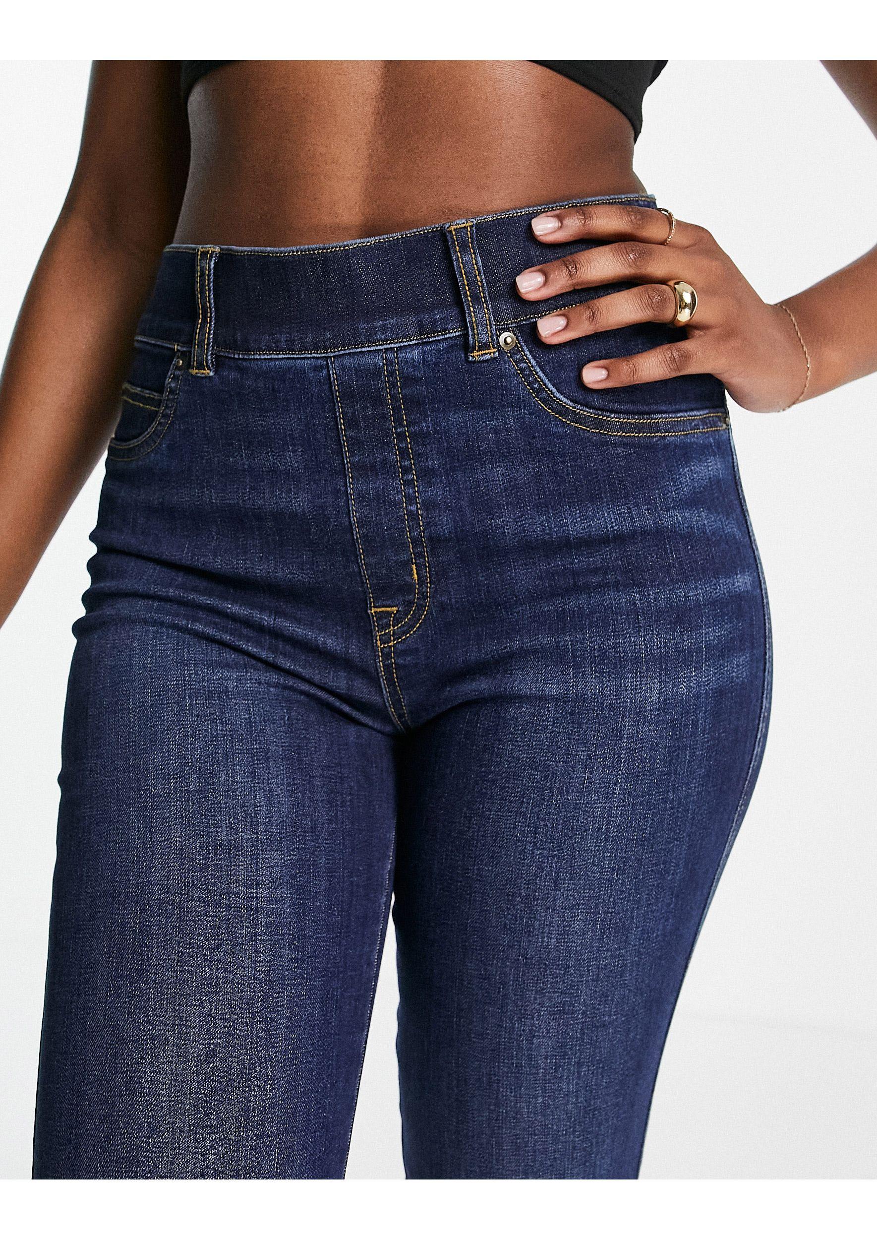 Spanx high rise flare jeans in dark wash