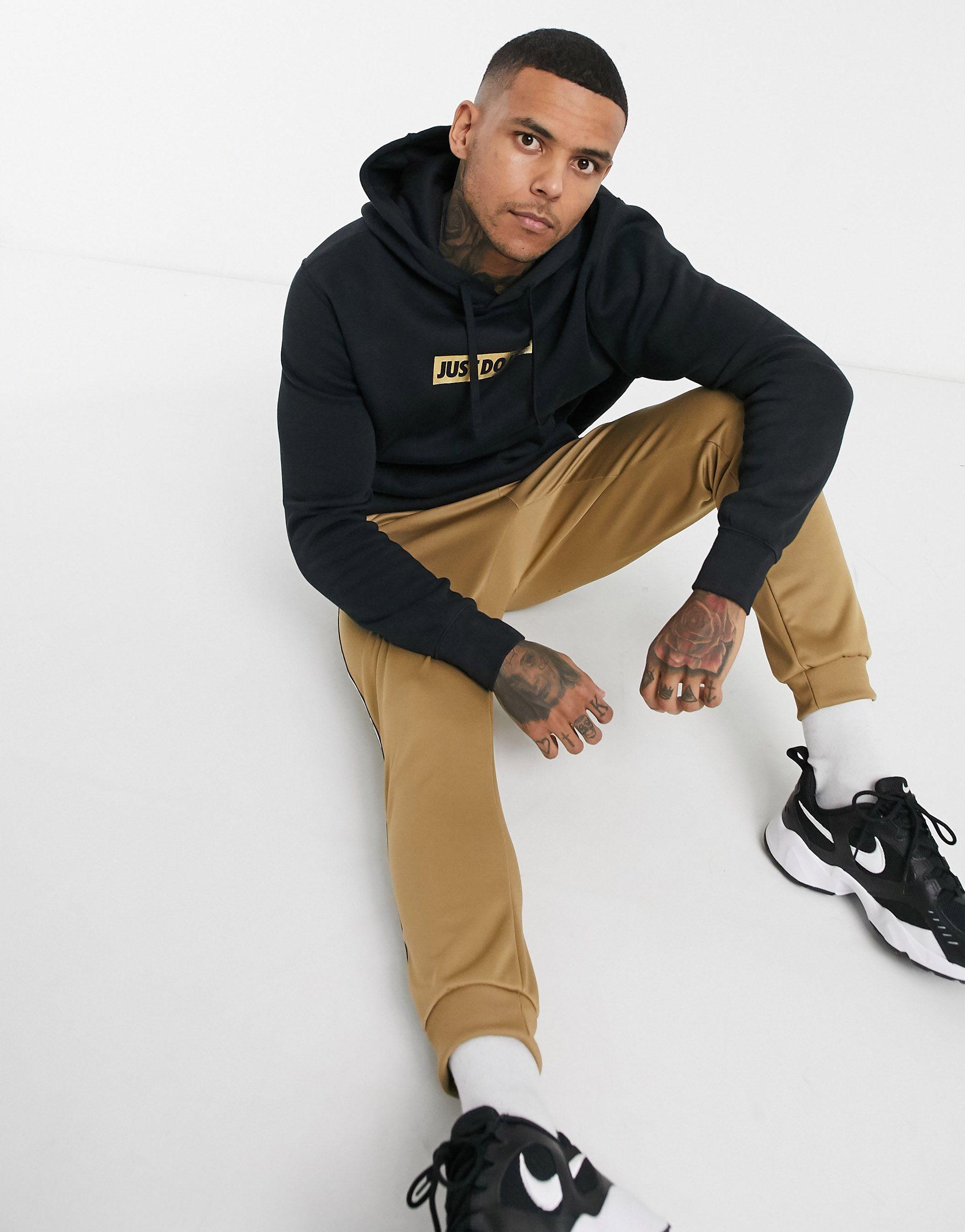 Sudadera con capucha negra con logo metalizado Just Do It Nike de Algodón  de color Negro para hombre | Lyst