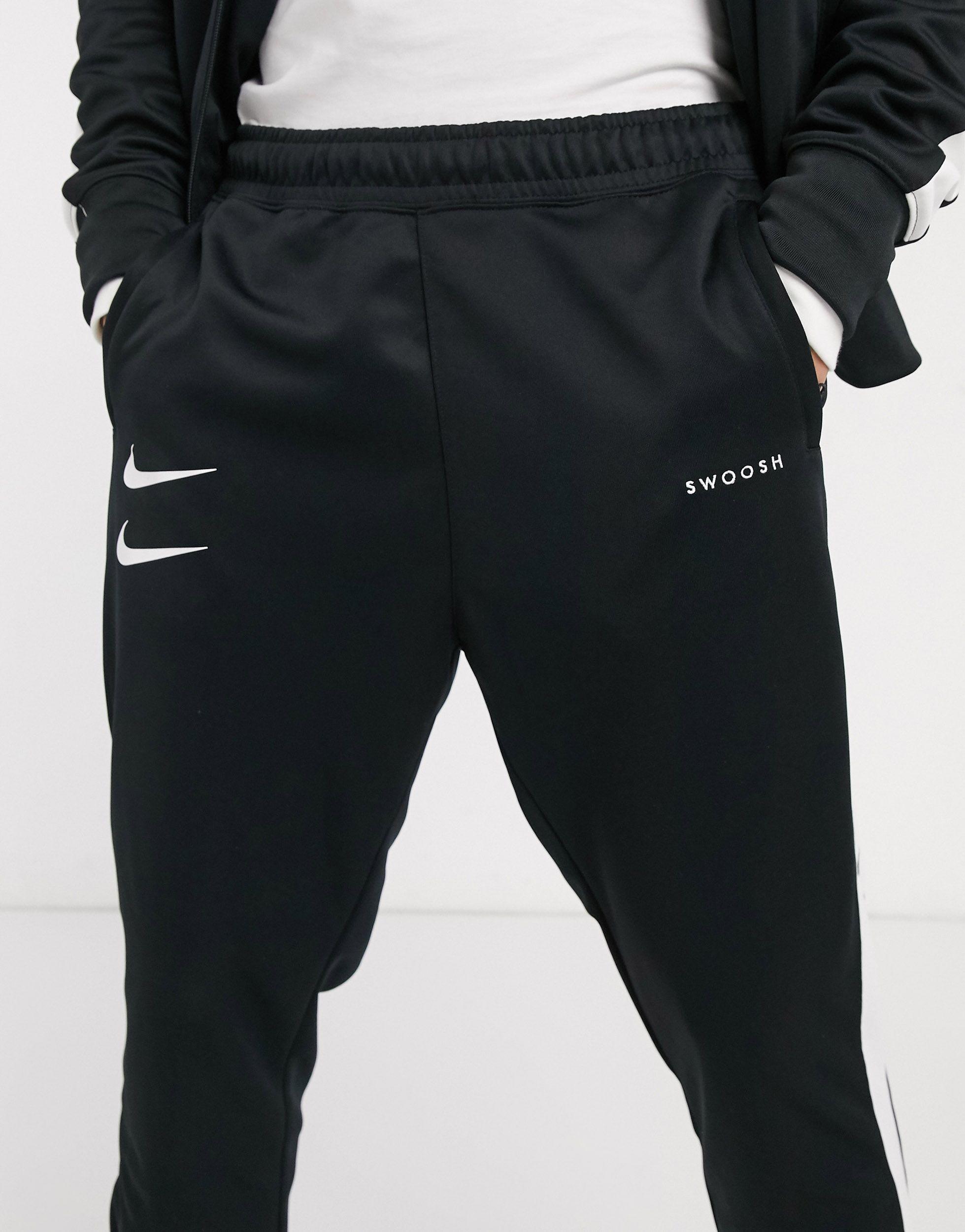 Nike Synthetic Swoosh Polyknit Trackies in Black for Men | Lyst