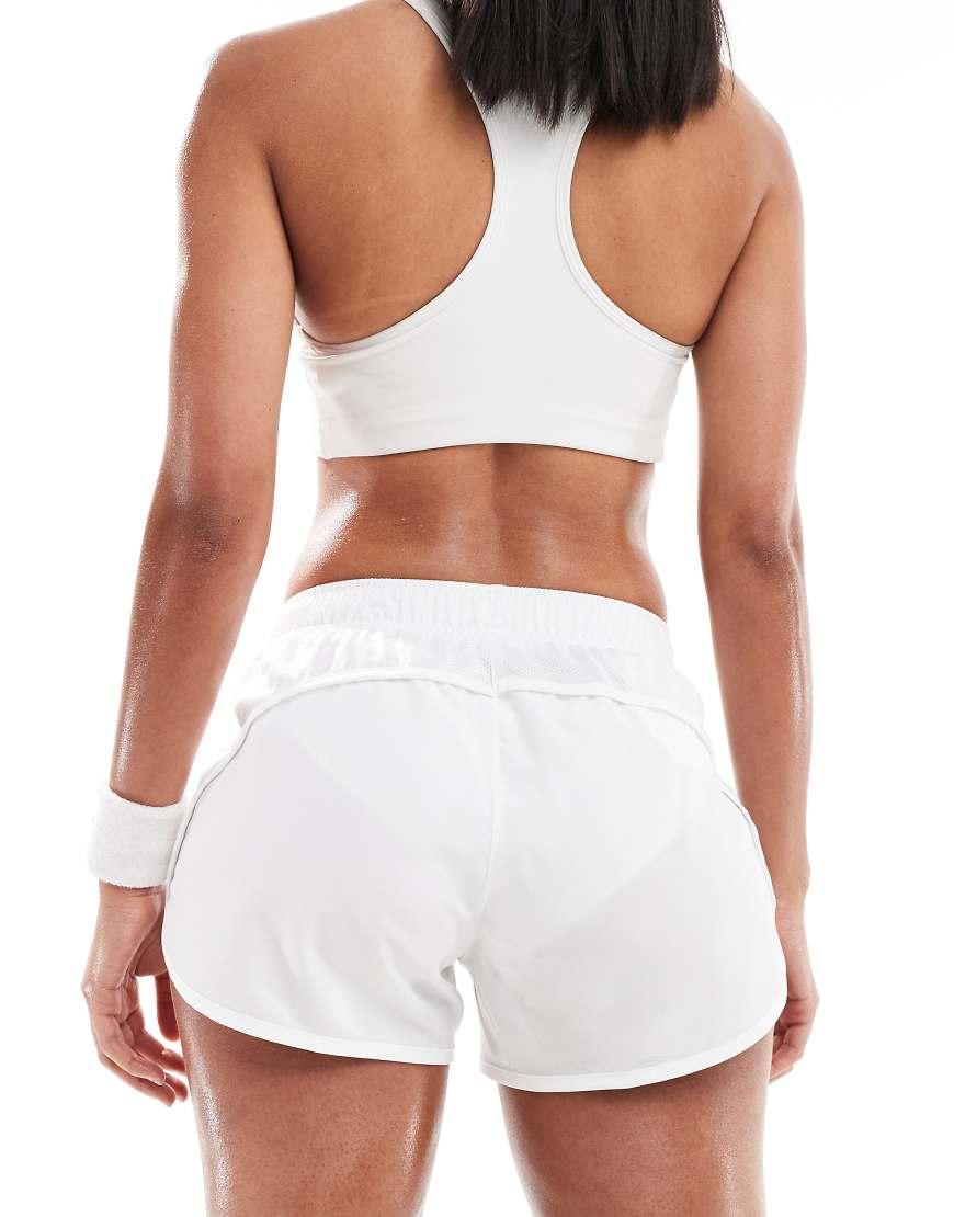 white nike tempo running shorts