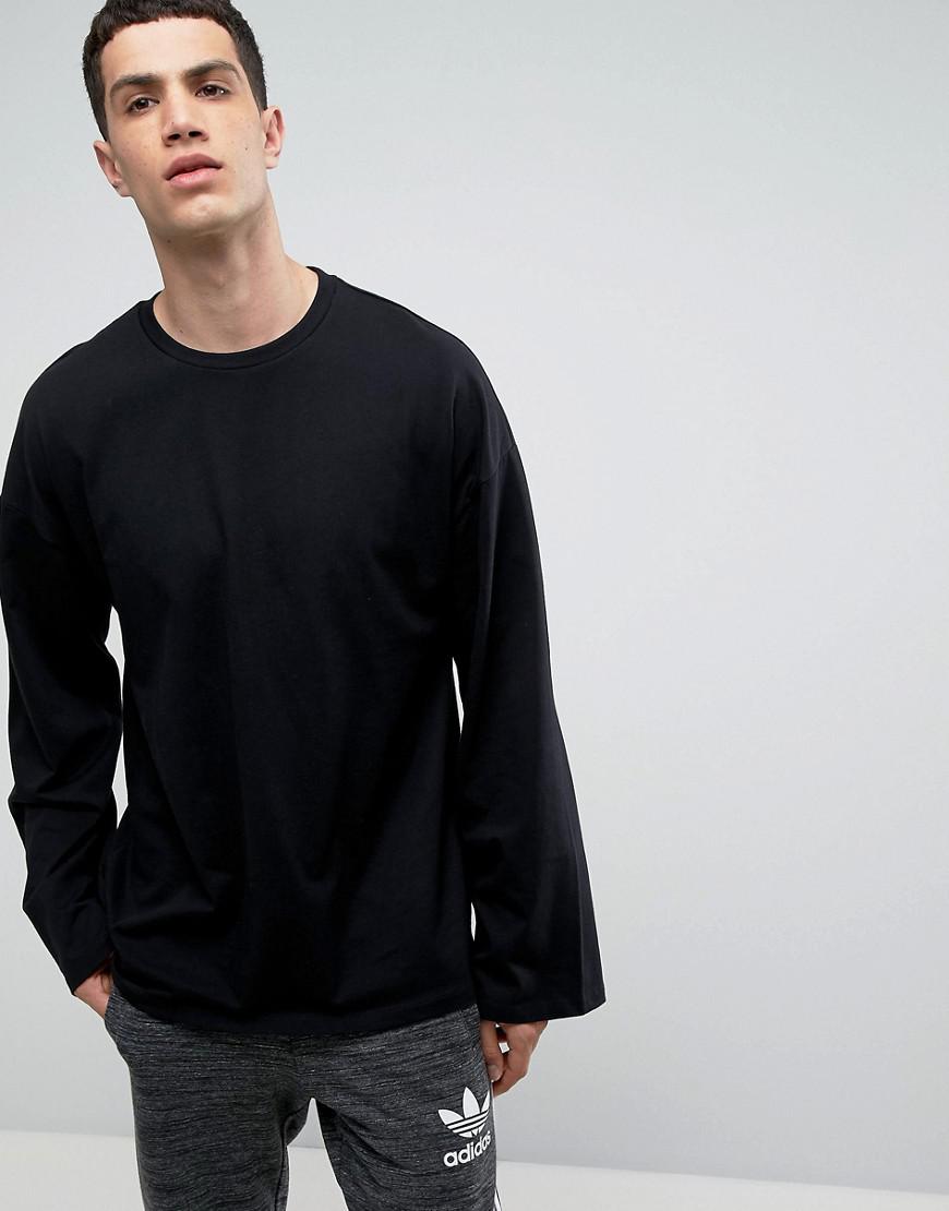 ASOS Oversized Long Sleeve T-shirt In Heavy Jersey With Wide Sleeve In Black  for Men | Lyst