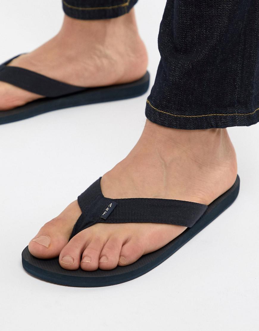 Abercrombie & Fitch Tab Logo Flip Flops In Navy in Blue for Men | Lyst