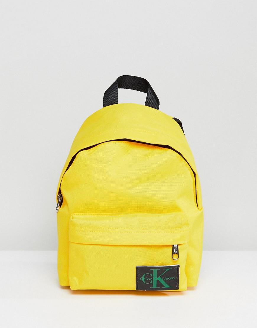 calvin klein yellow backpack