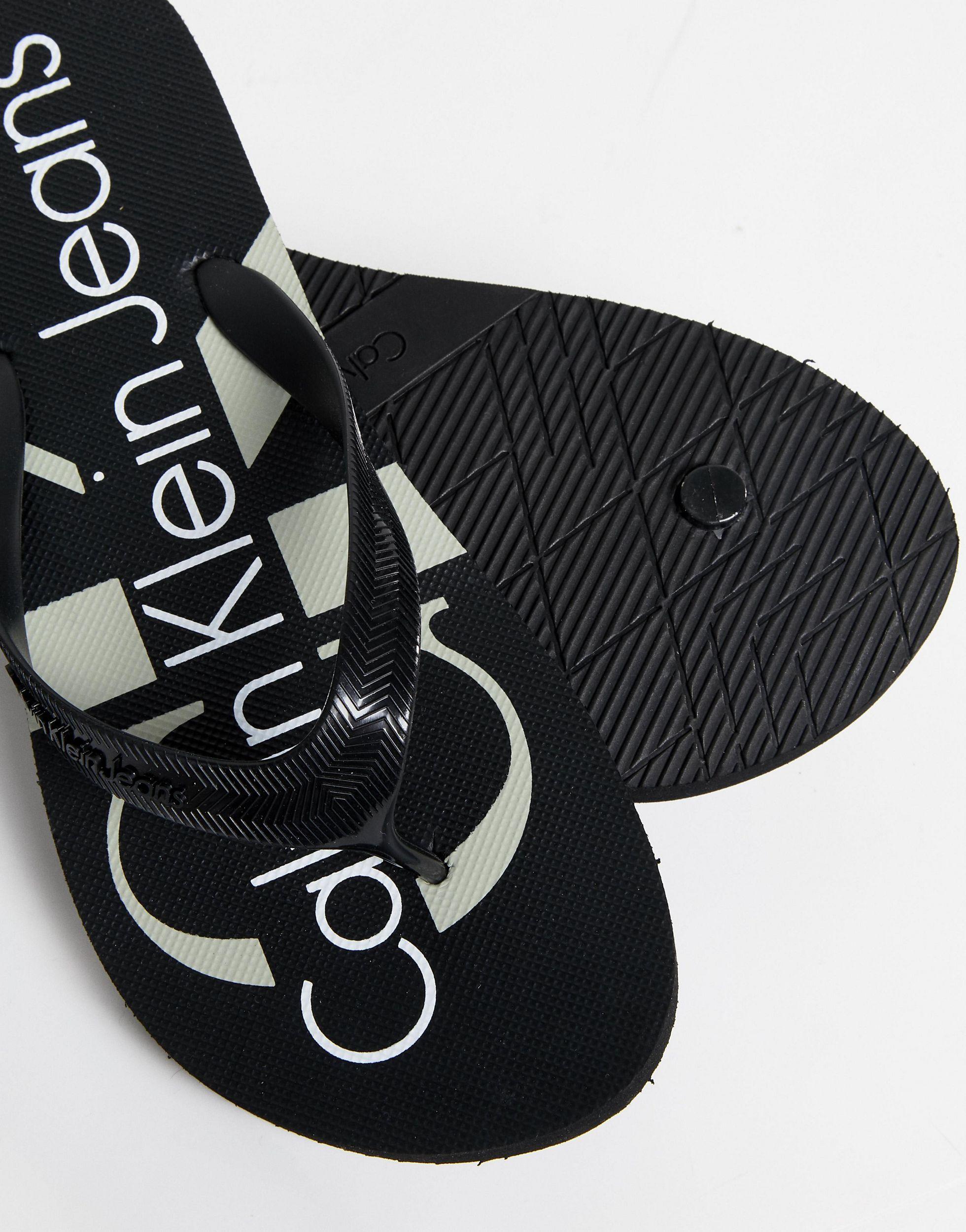 Calvin Klein Dash Logo Flip Flops In Black for Men | Lyst