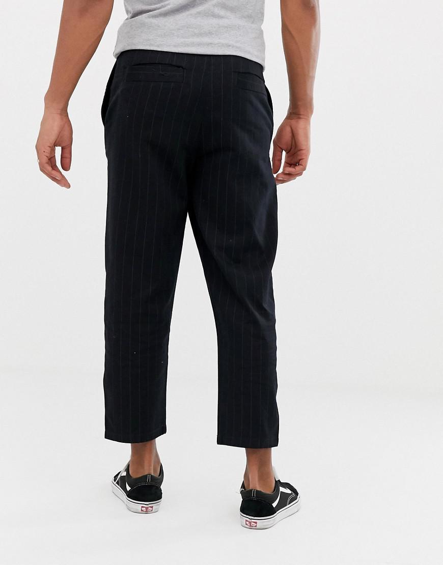 Bershka Carrot Fit Trousers With Pin Stripe In Black for Men | Lyst