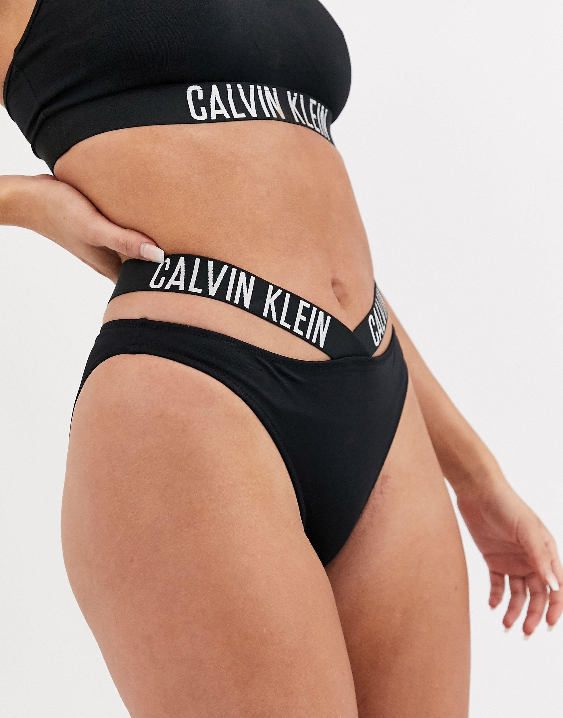 Calvin Klein Cut Out Logo Bikini Bottoms-black | Lyst UK