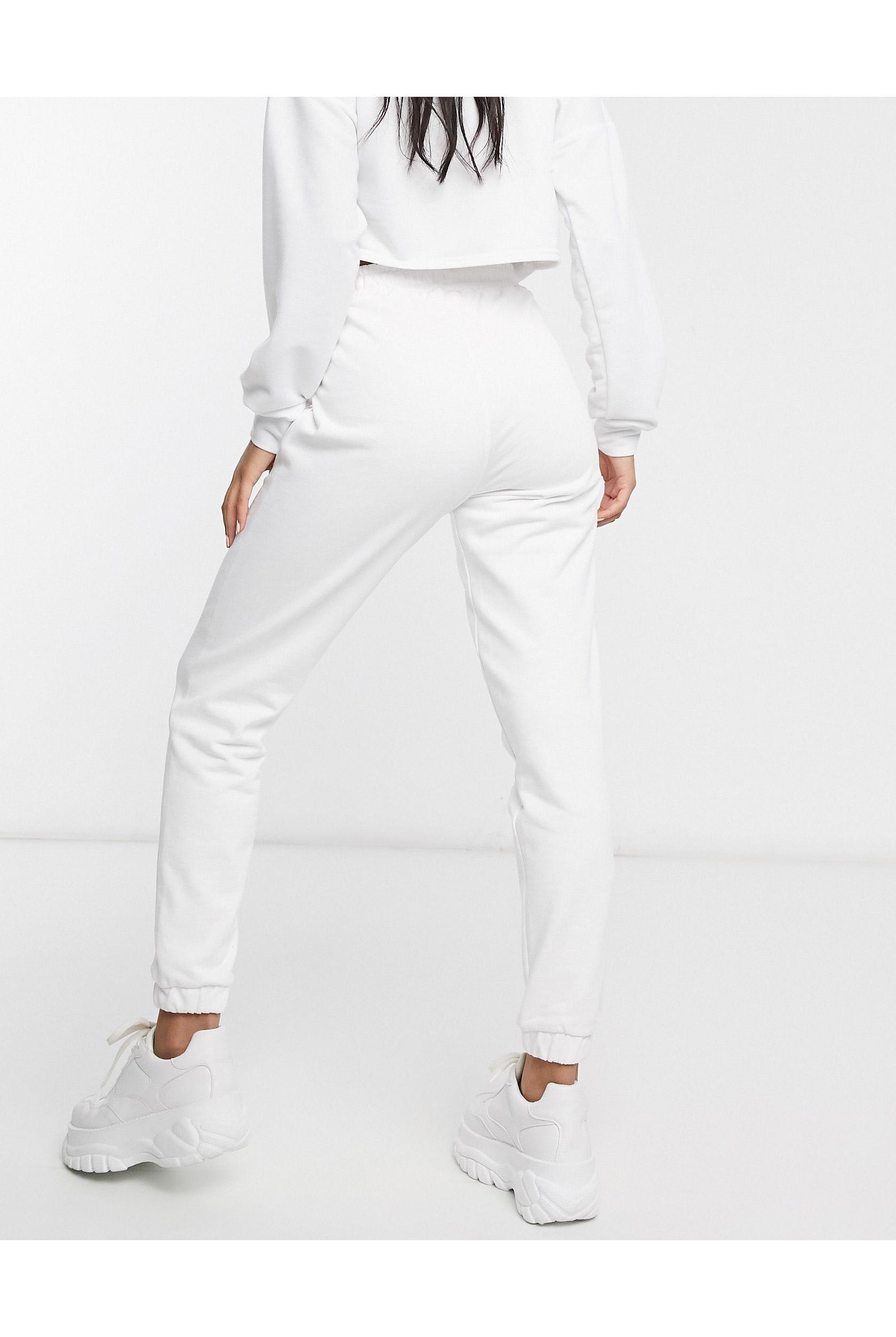white puma joggers