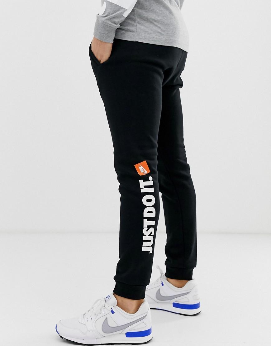 Nike Just Do It Fleece Joggers in Black for Men Lyst UK