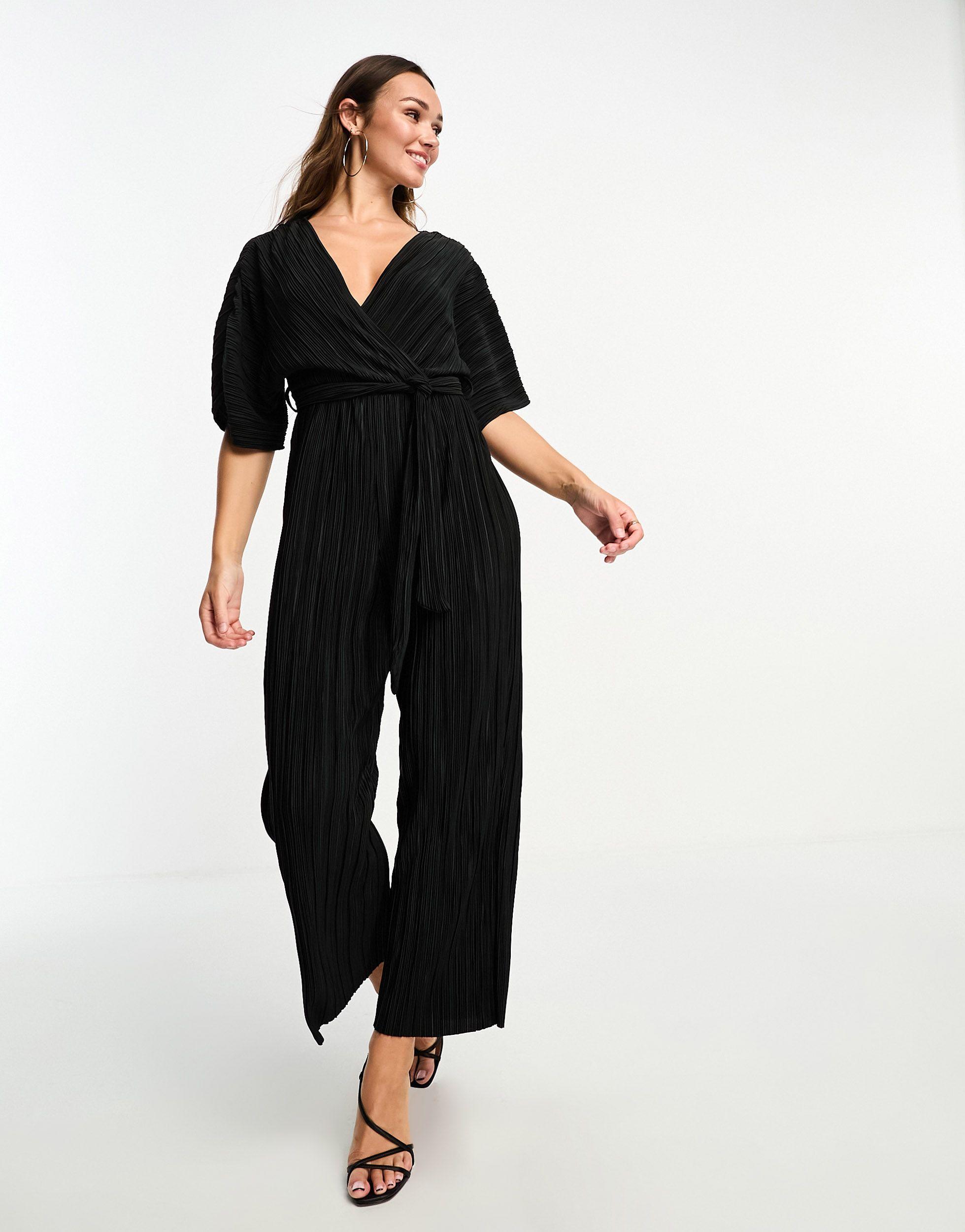 Y.A.S Plisse Belted Jumpsuit in Black | Lyst