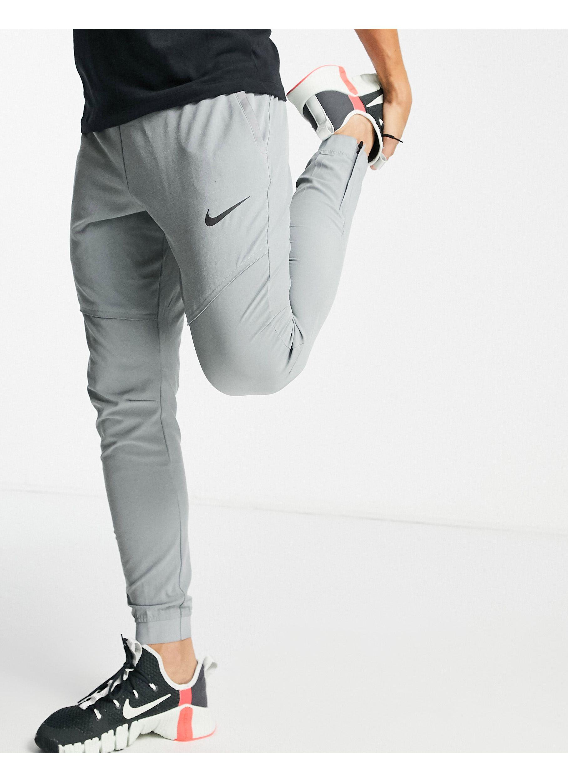 Pantalon de Survetement Flex Pro Nike pour homme en coloris Gris Lyst