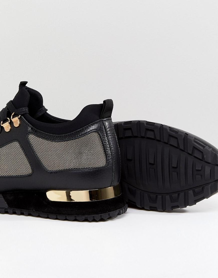 black and gold mallets