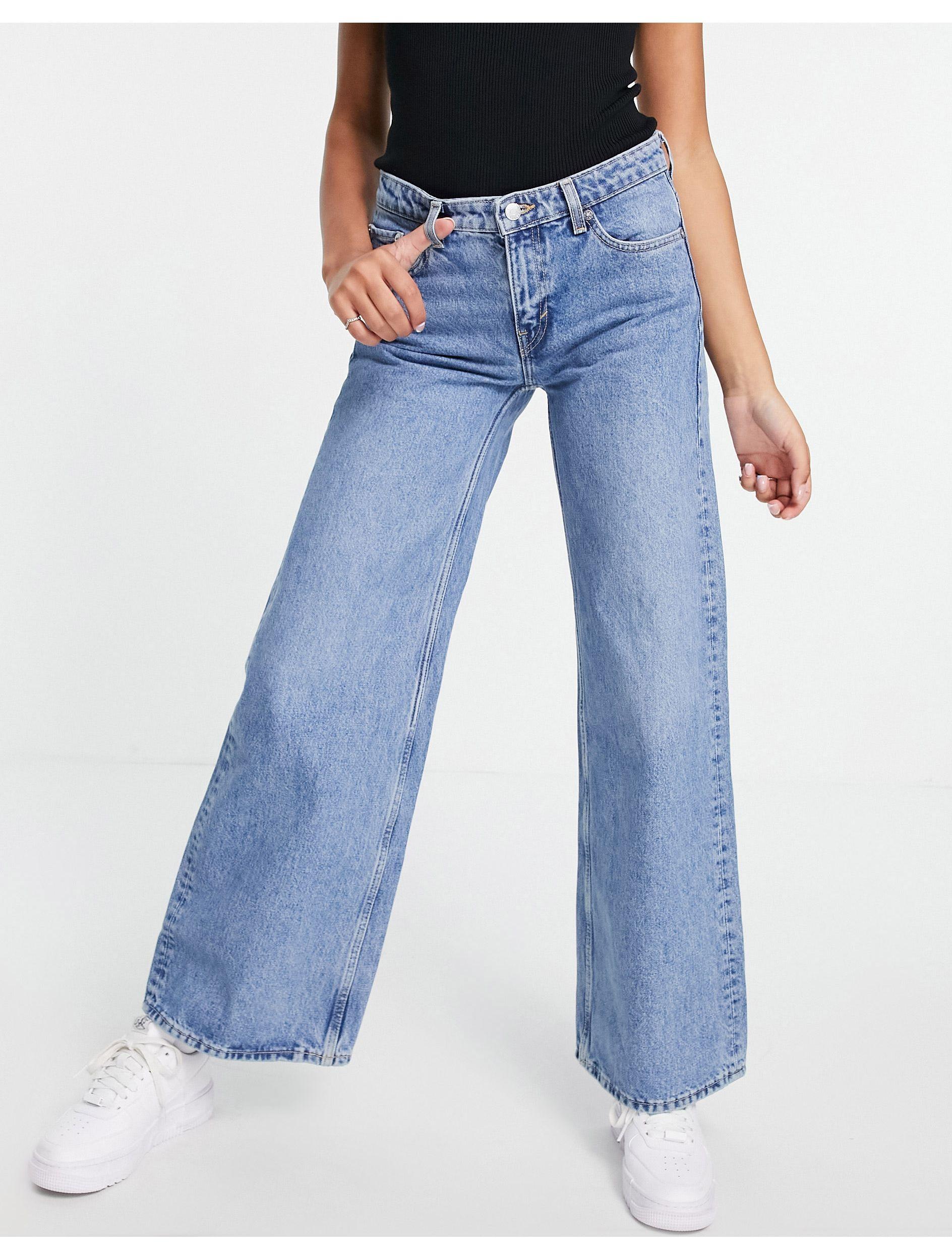 Weekday Baumwolle – ray – jeans aus bio-baumwolle mit niedrigem bund und  weiten beinen in Blau - Lyst