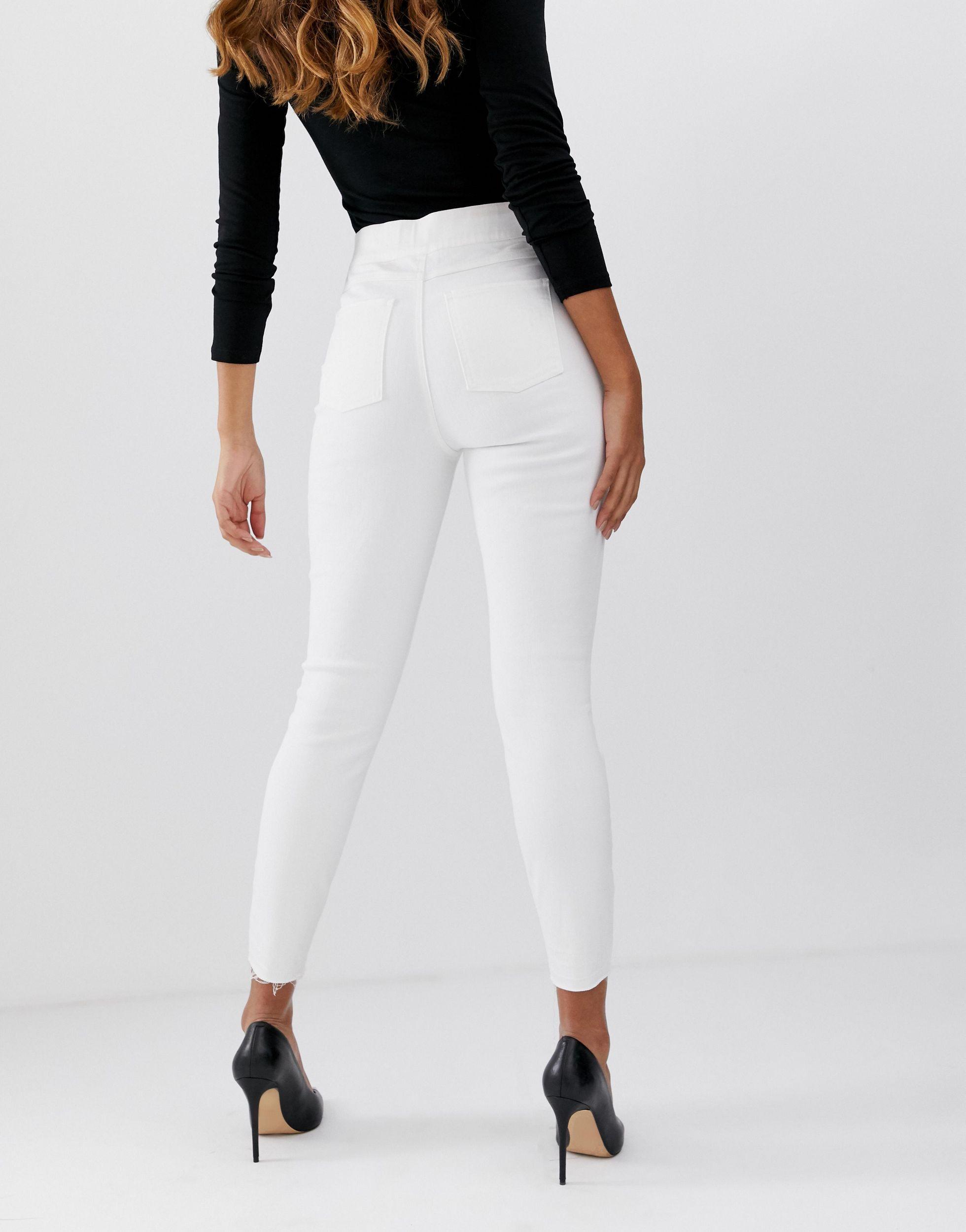 Spanx Denim Shape And Lift Distressed Skinny Jeans in White - Lyst