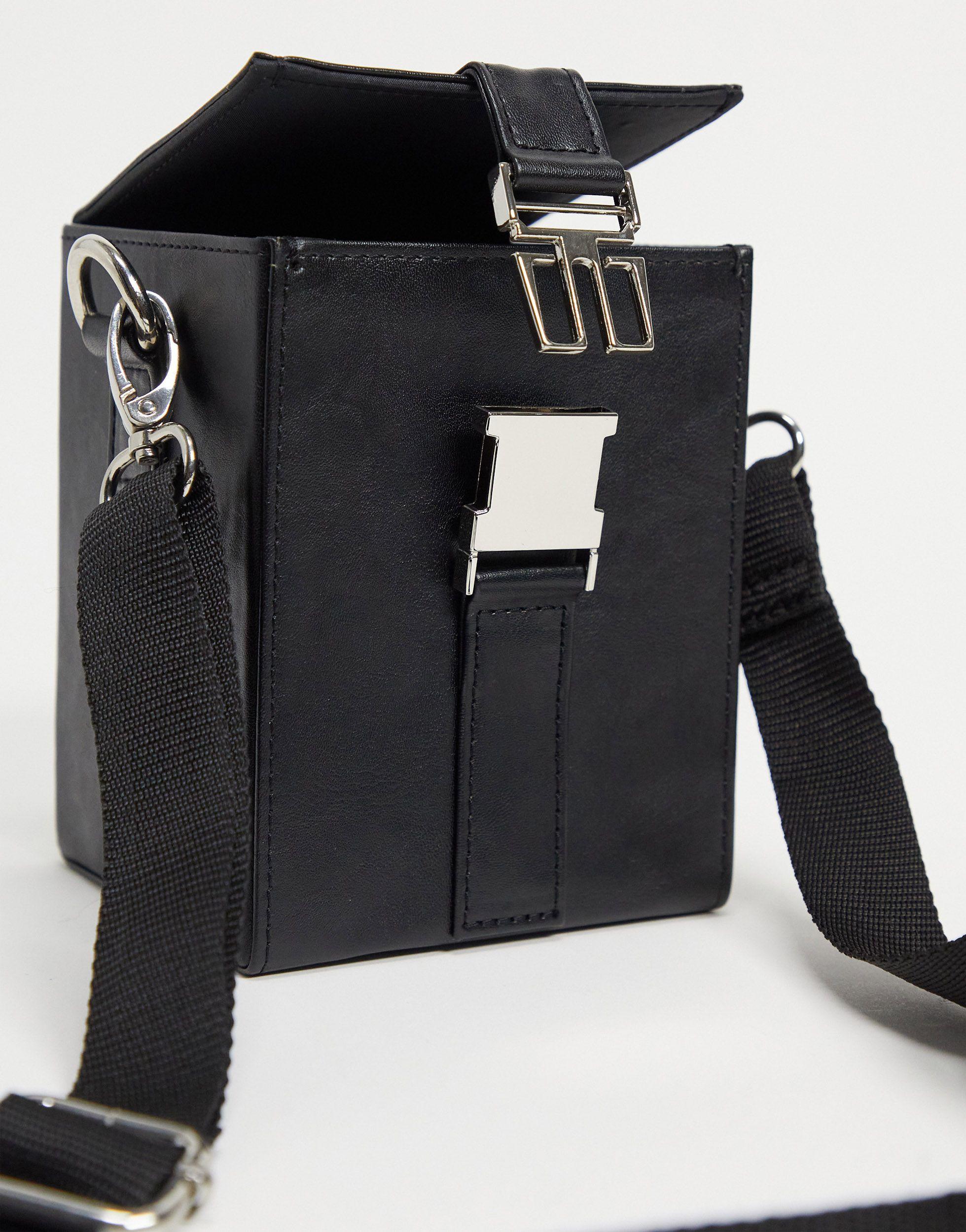 ASOS Design leather messenger cross-body bag with clips in Black