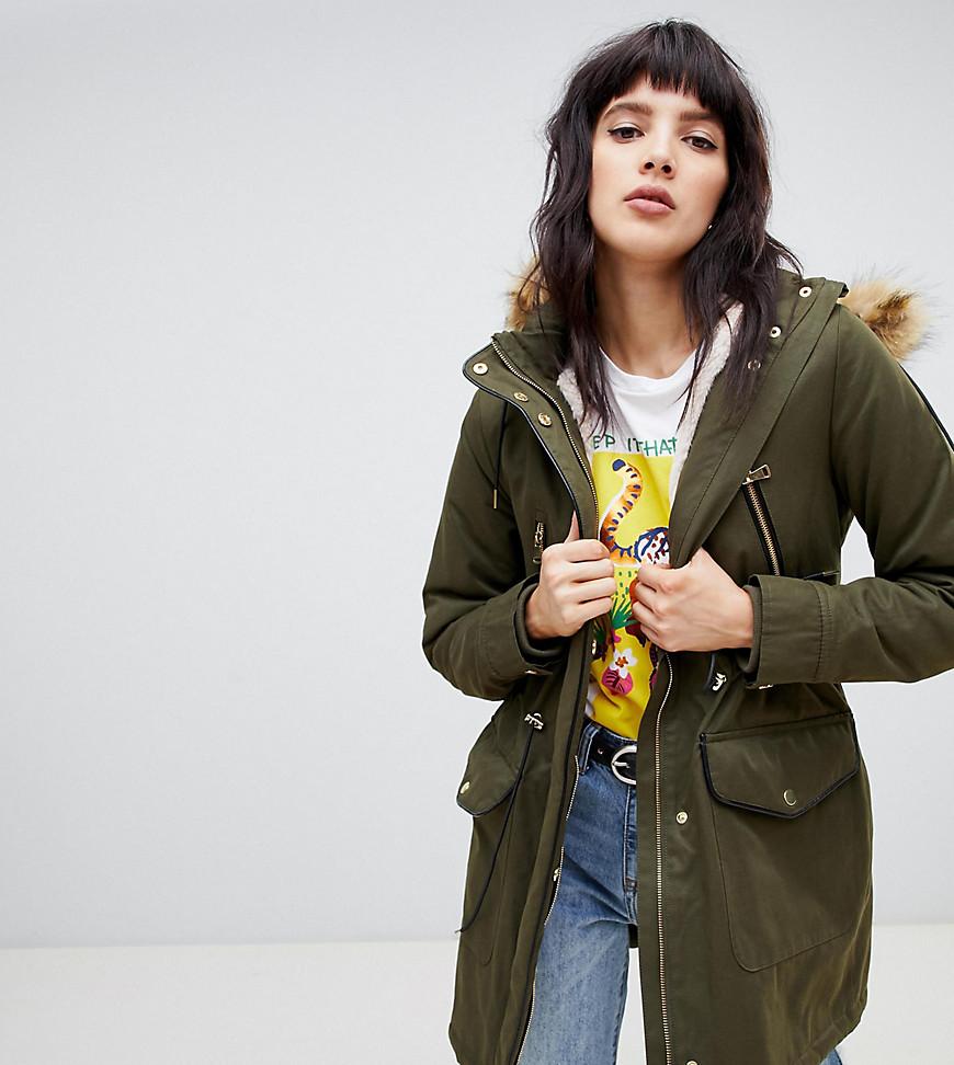 Parka avec capuche en fausse fourrure Jean Stradivarius en coloris Noir -  Lyst