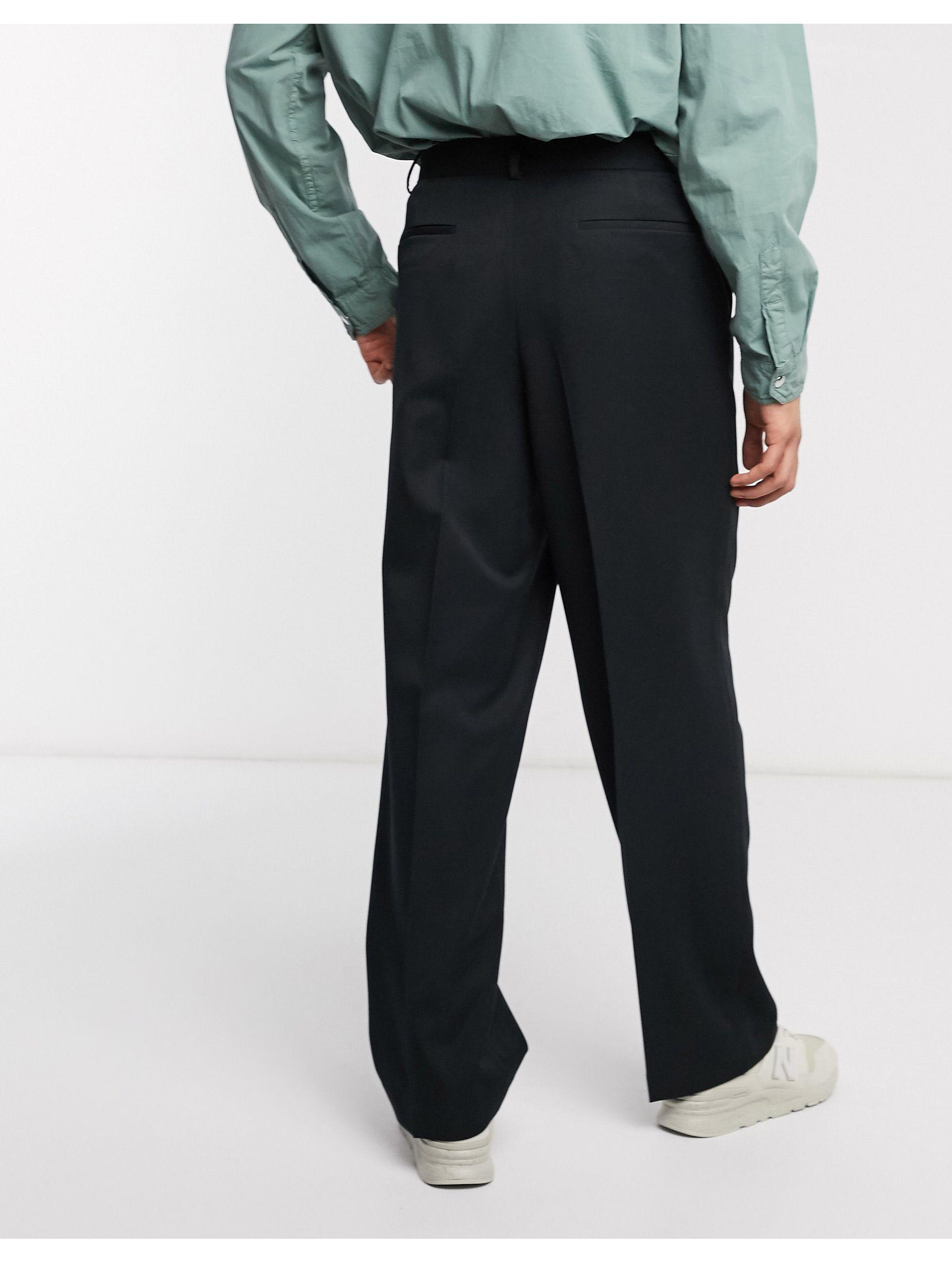 Pantaloni eleganti con fondo ampio neriASOS in Materiale sintetico da Uomo  colore Nero | Lyst