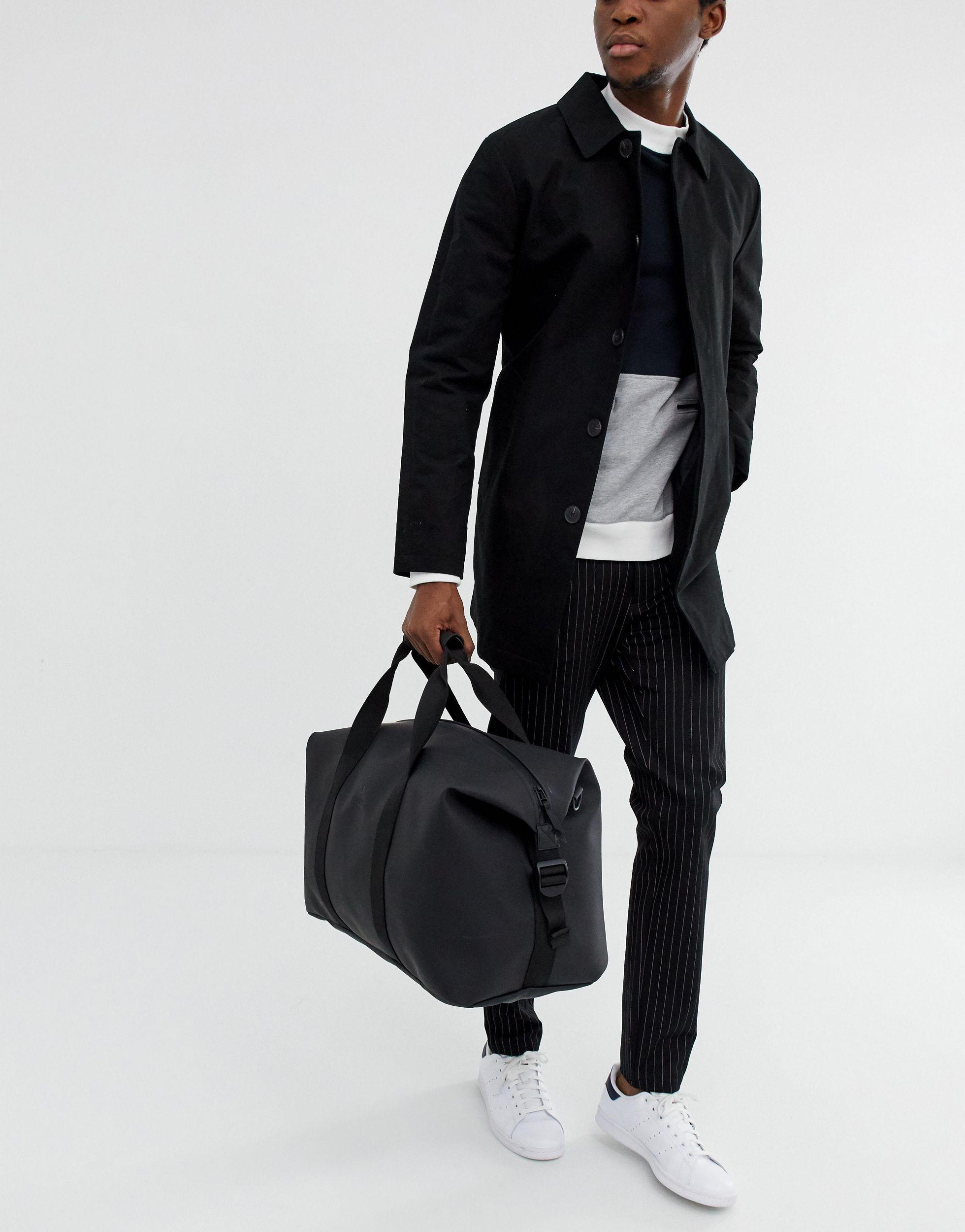 Mens Bags Duffel bags and weekend bags Rains Black Waterproof Rubberised Holdall for Men 