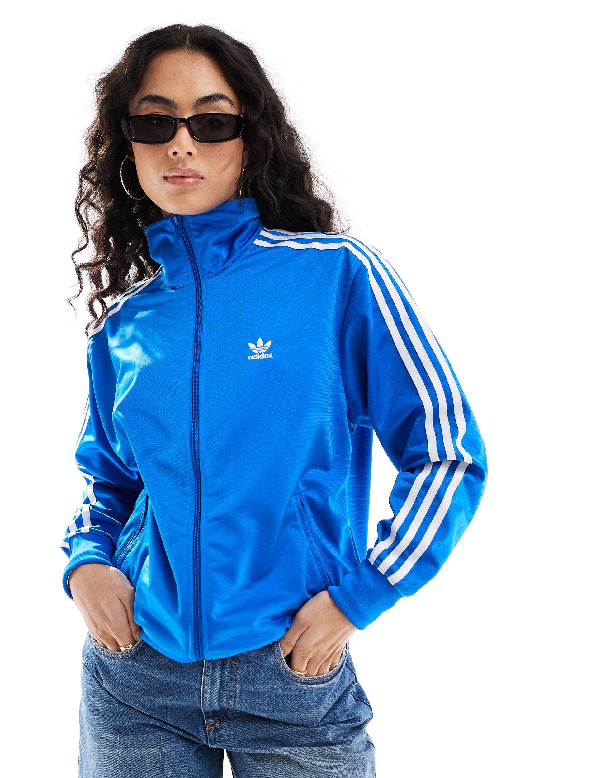 Adidas originals blue track top hotsell