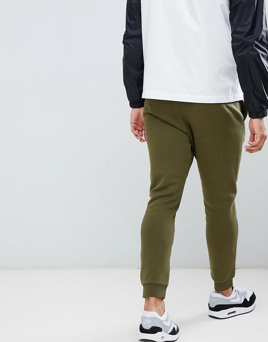 nike club swoosh joggers