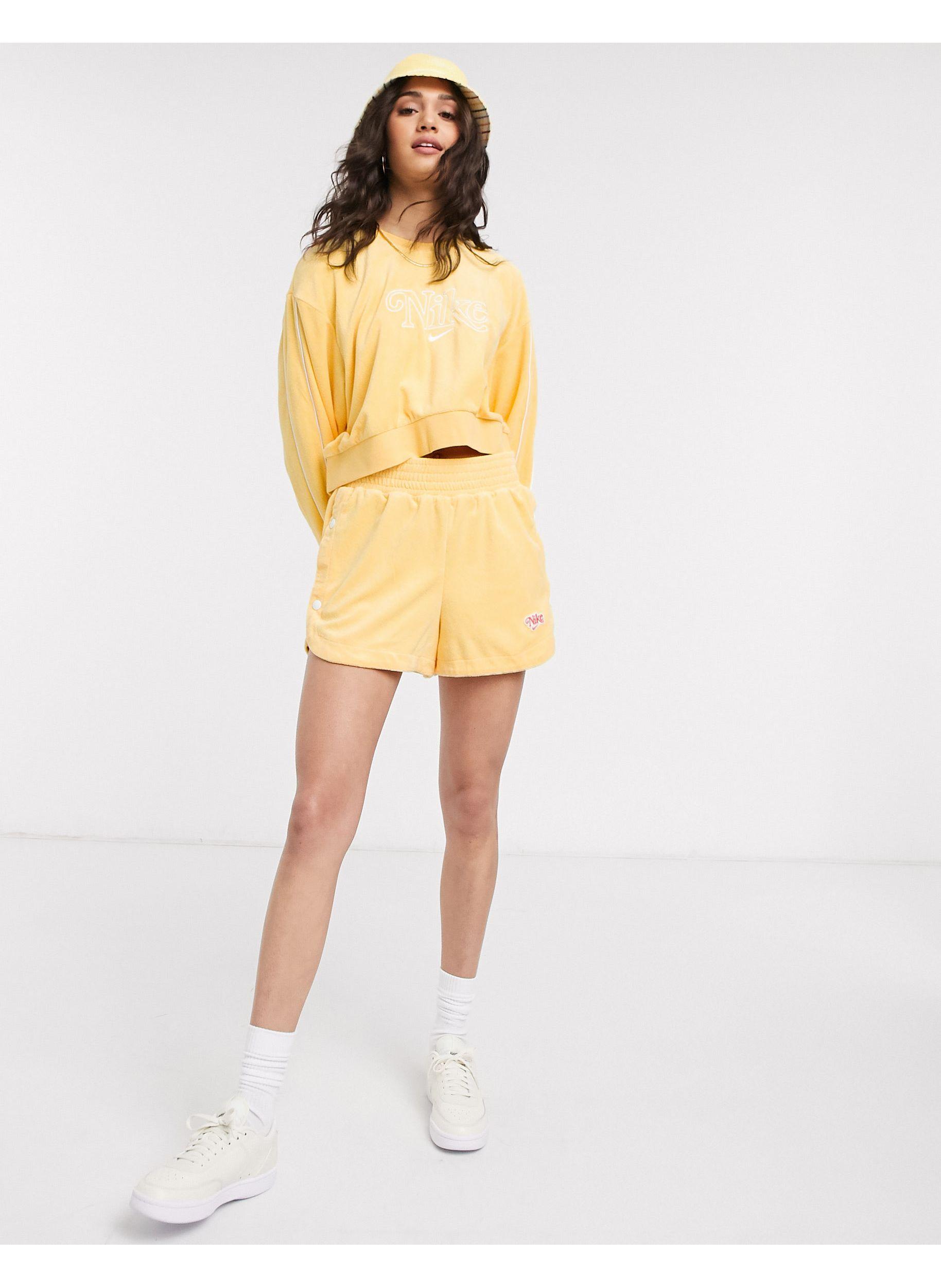 Nike Terry Towelling Shorts in Yellow Lyst UK