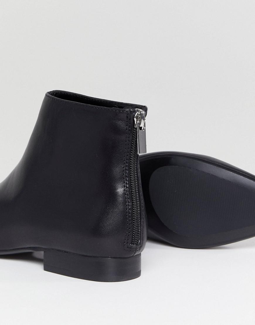flat black pointed boots
