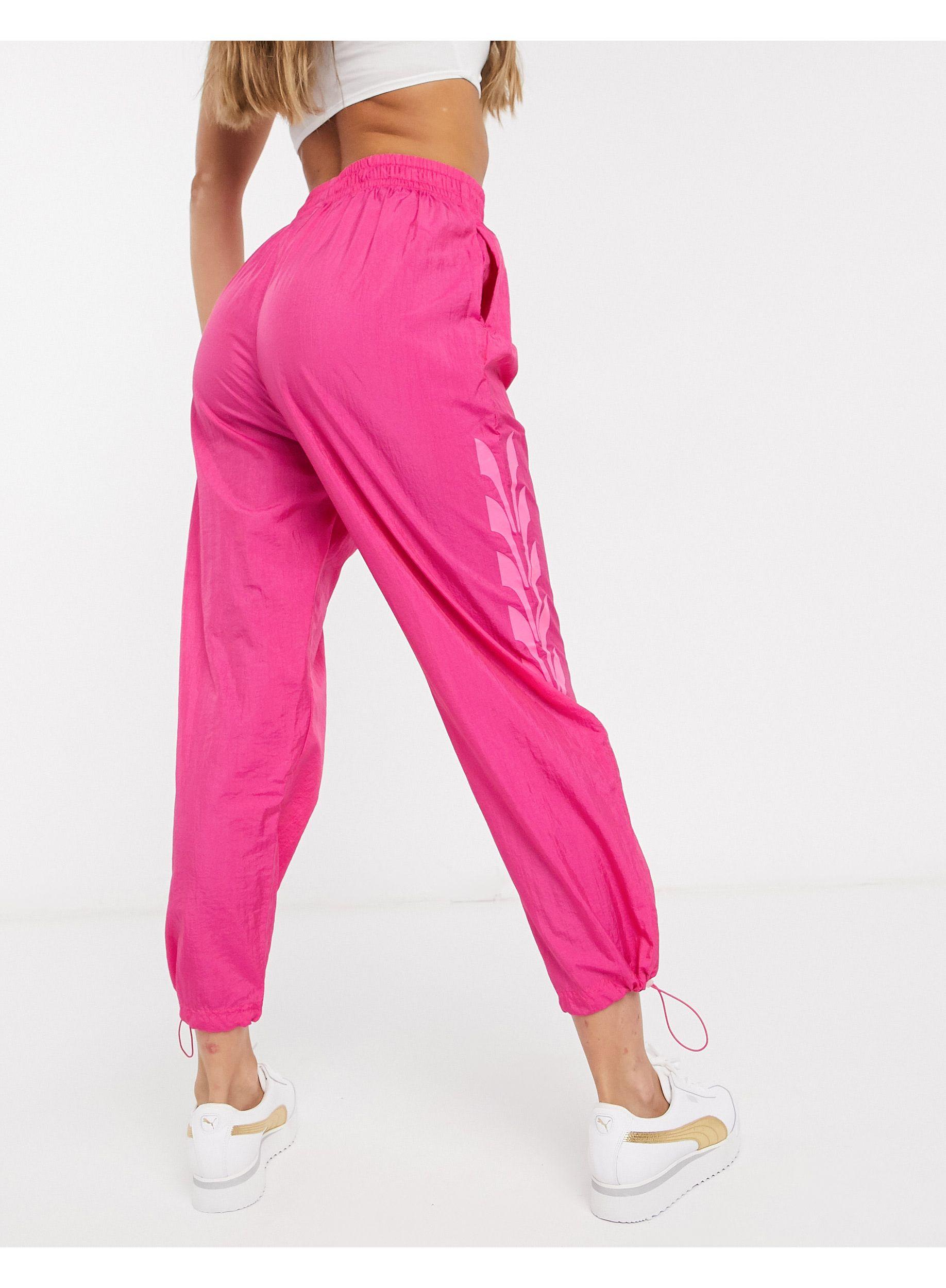 PUMA Evide Track Pants in Pink - Lyst