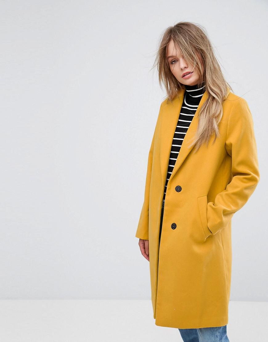 dark yellow coat