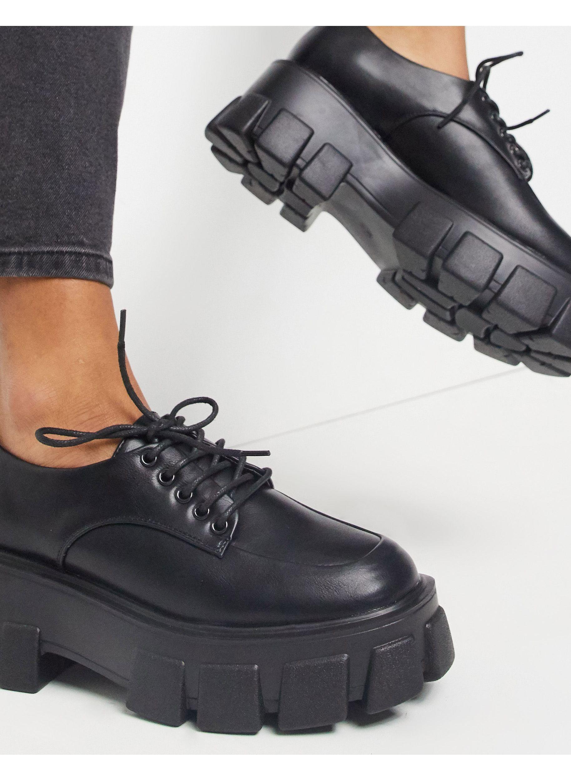 truffle collection wide fit chunky lace up boots in black