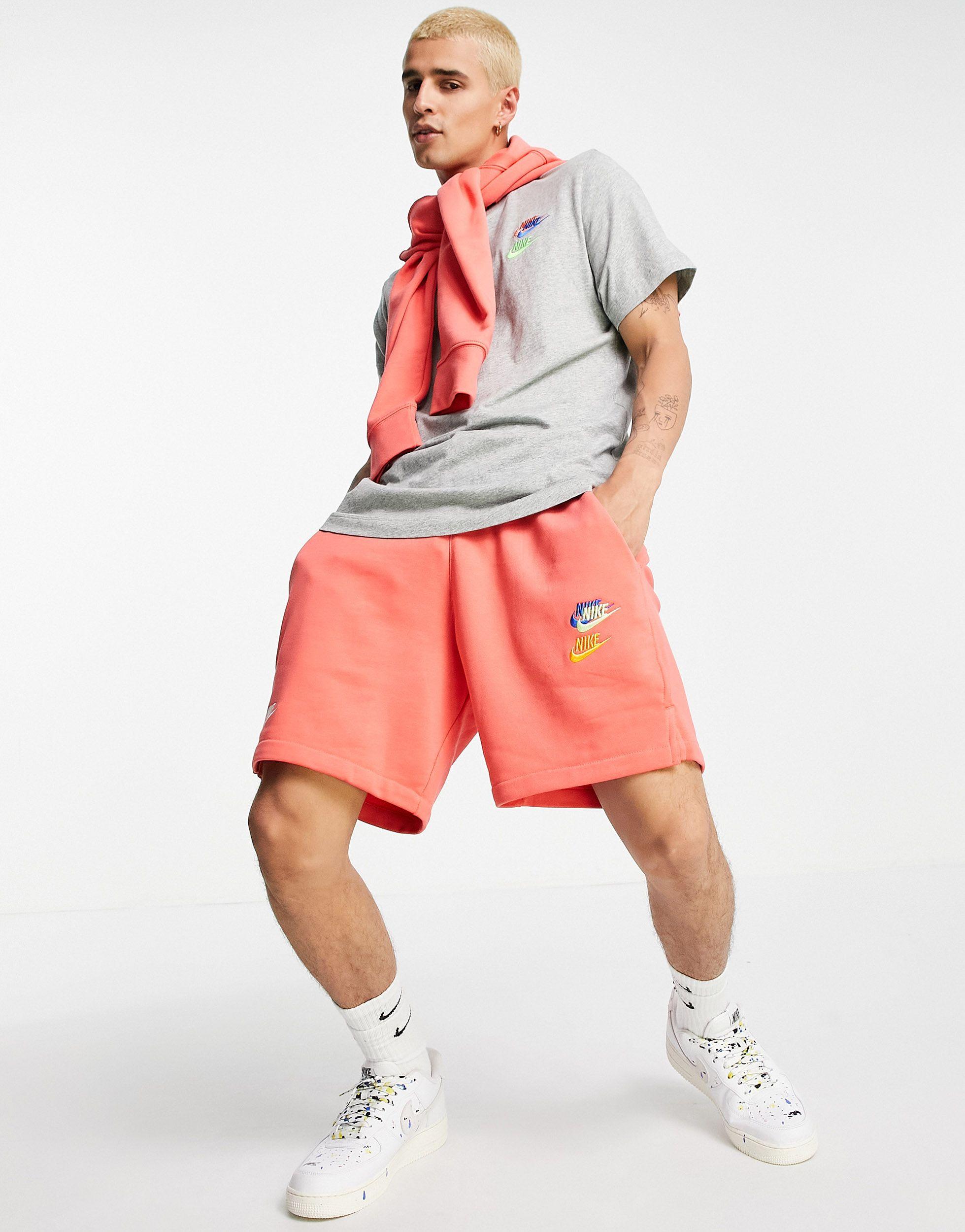 Nike Essentials+ Multi Logo T-shirt in 