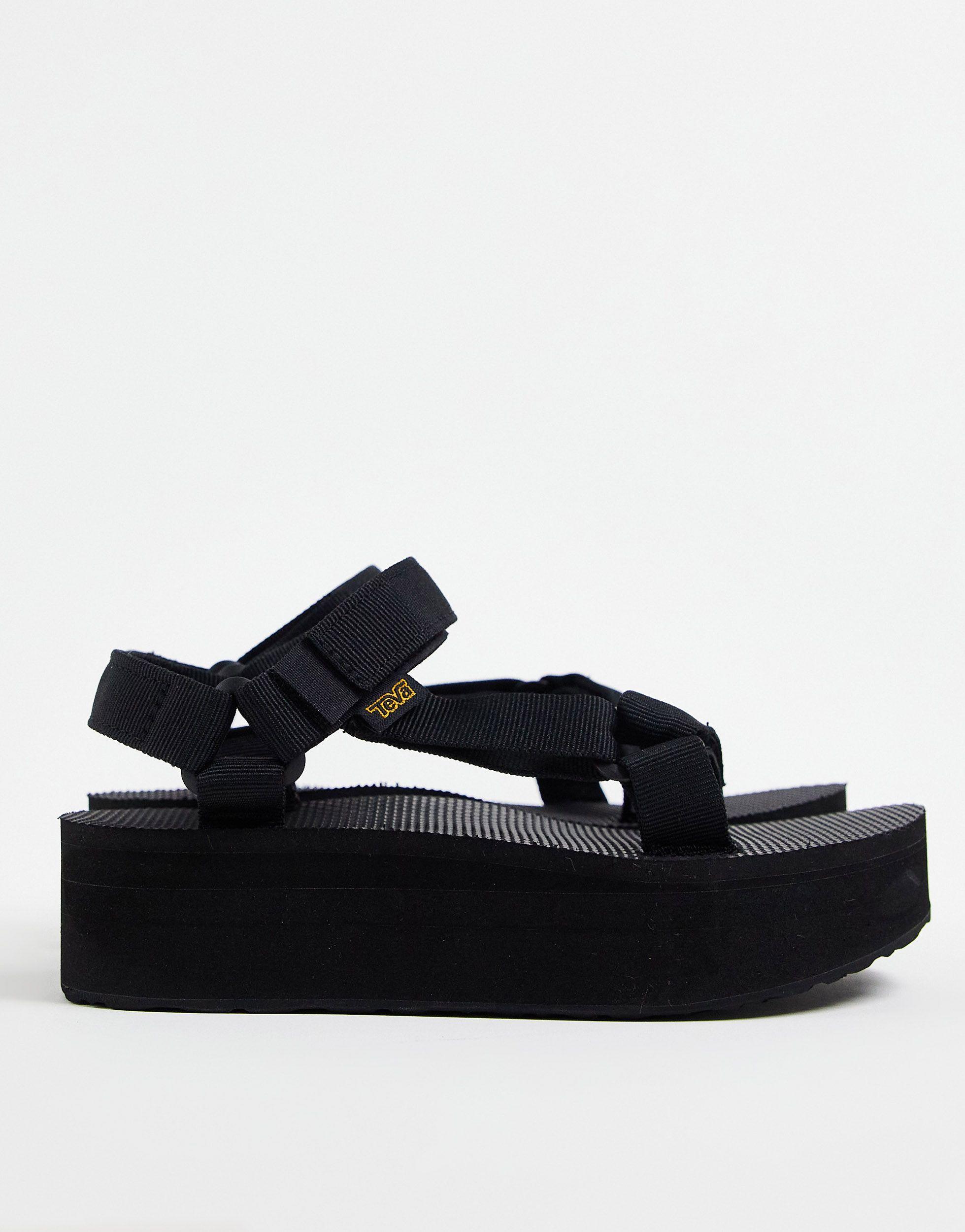 Sandalias gruesas con plataforma plana en universal Teva de Ante de color  Negro | Lyst