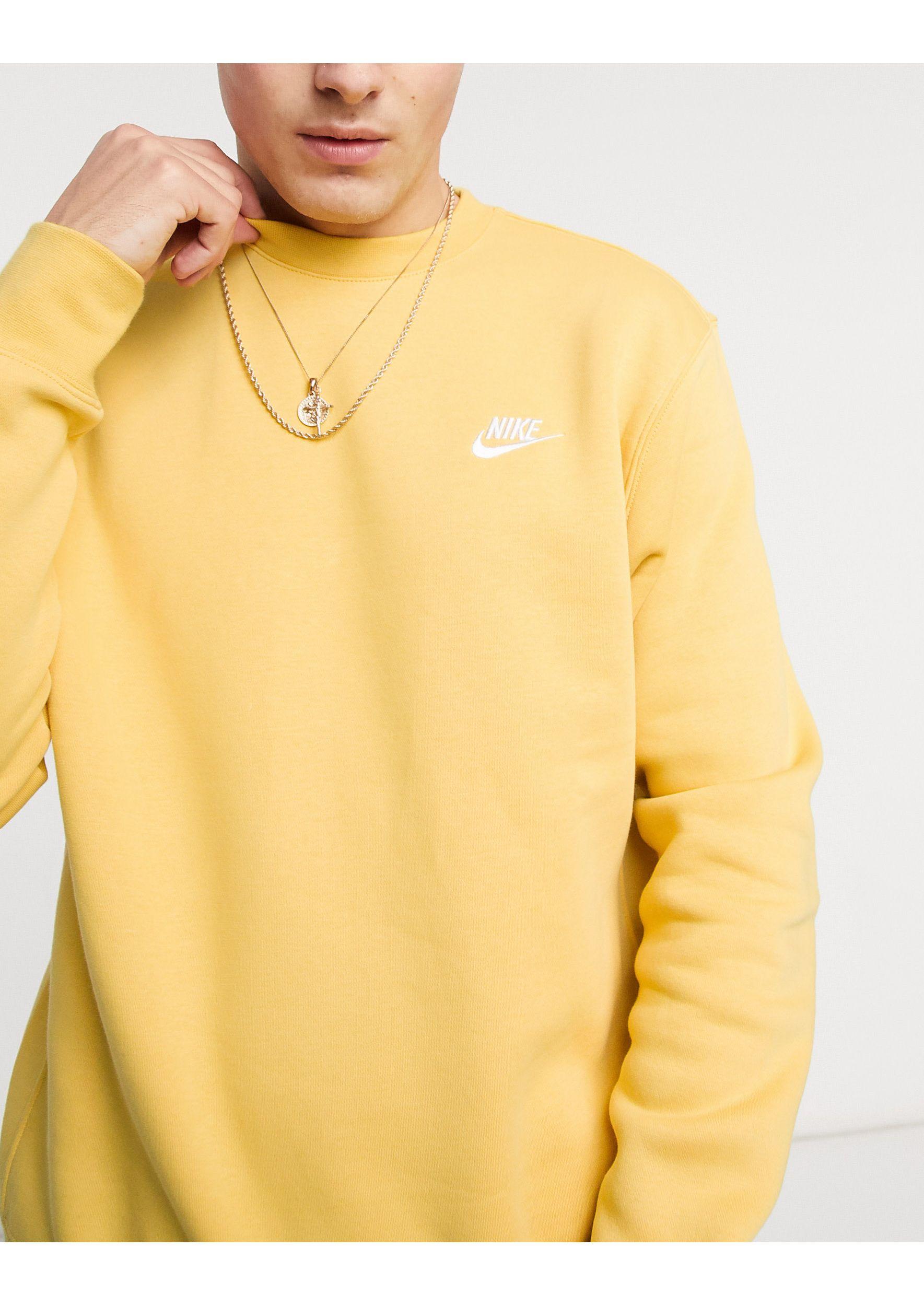nike club hoodie in mustard