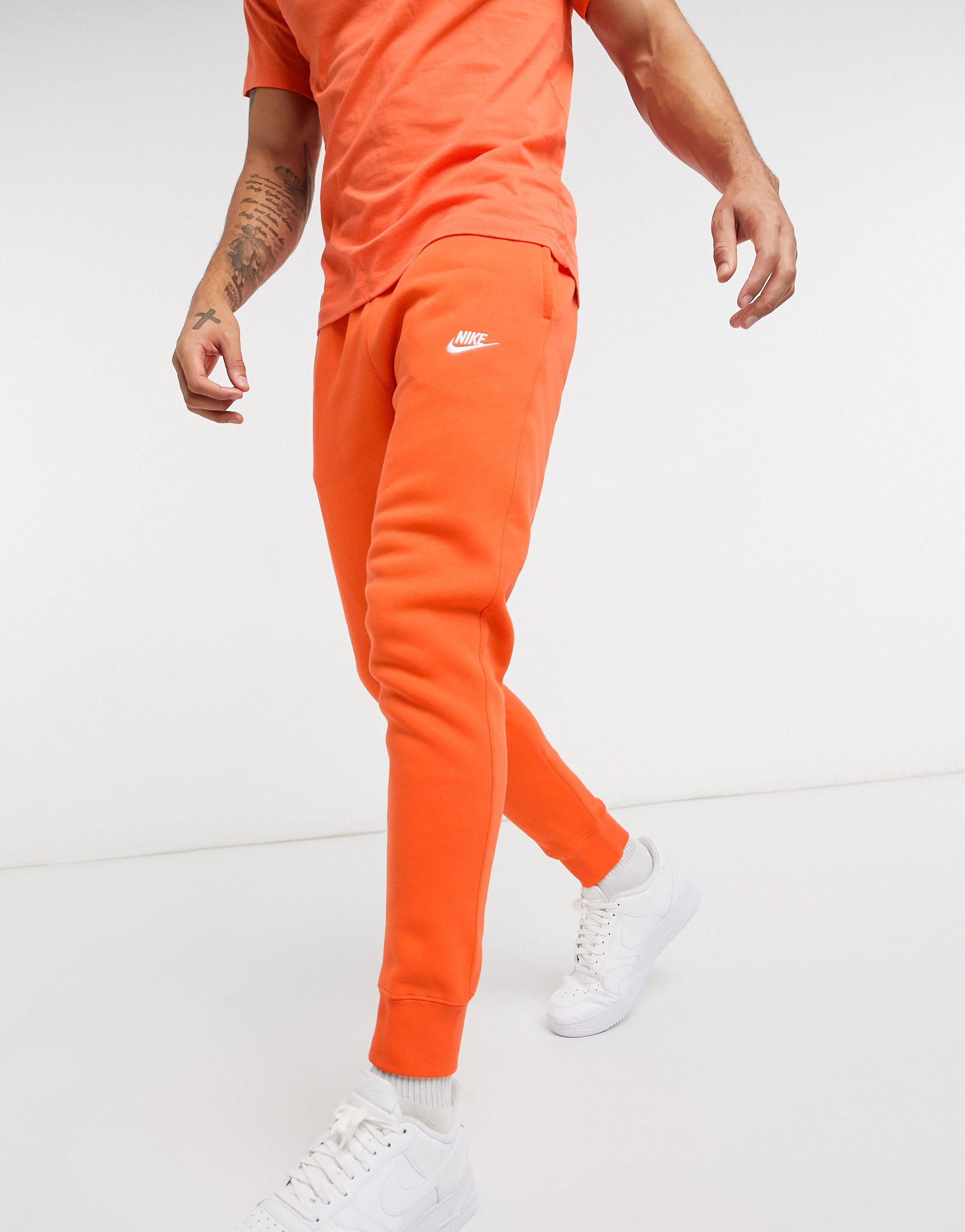 nike orange joggers