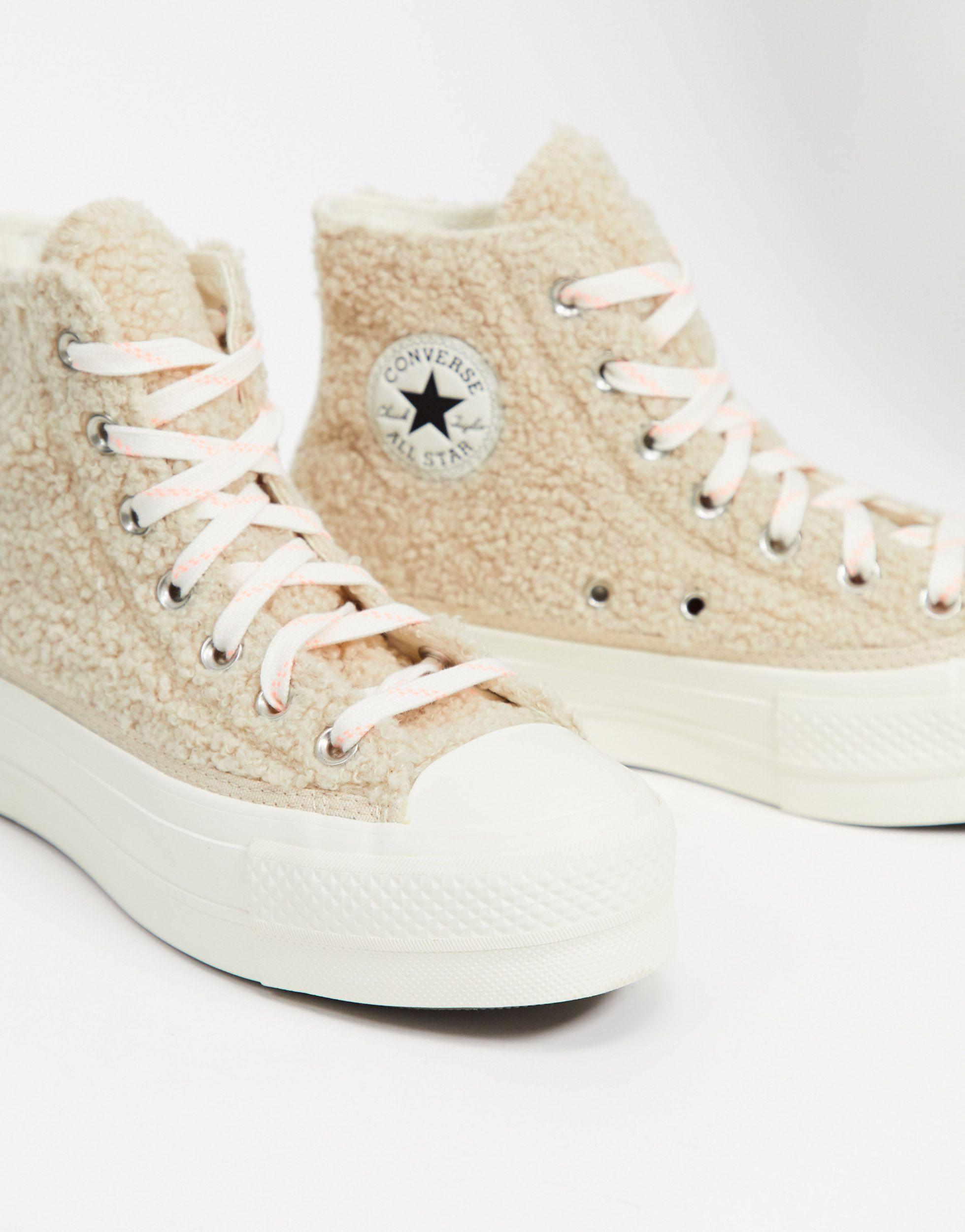 white & beige cozy lift hi trainers