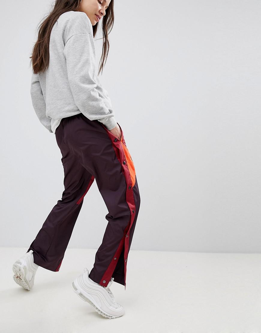 Pantalon de jogging tissé en color block avec boutons-pression Nike - Lyst