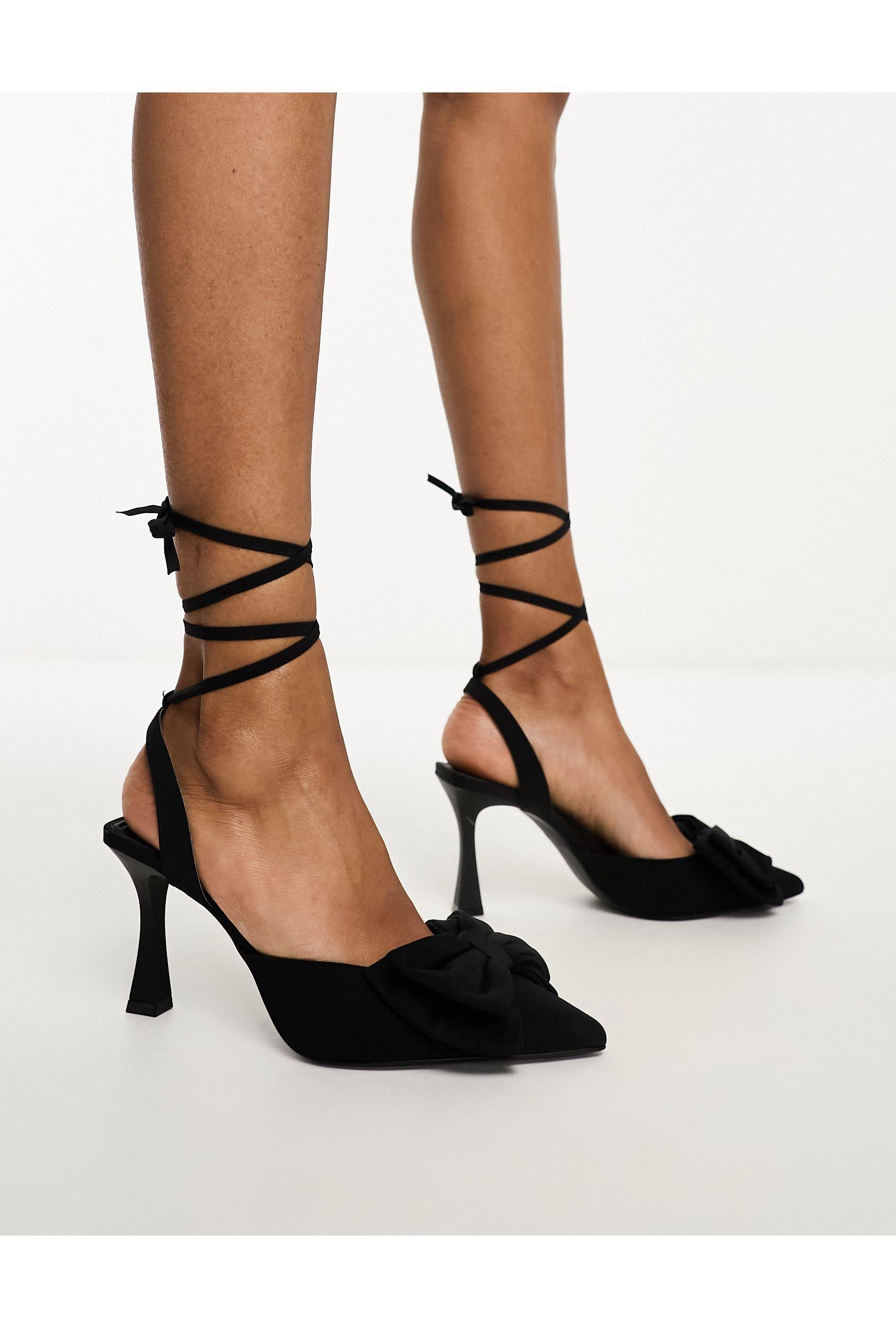 Black heels with sales bow on front