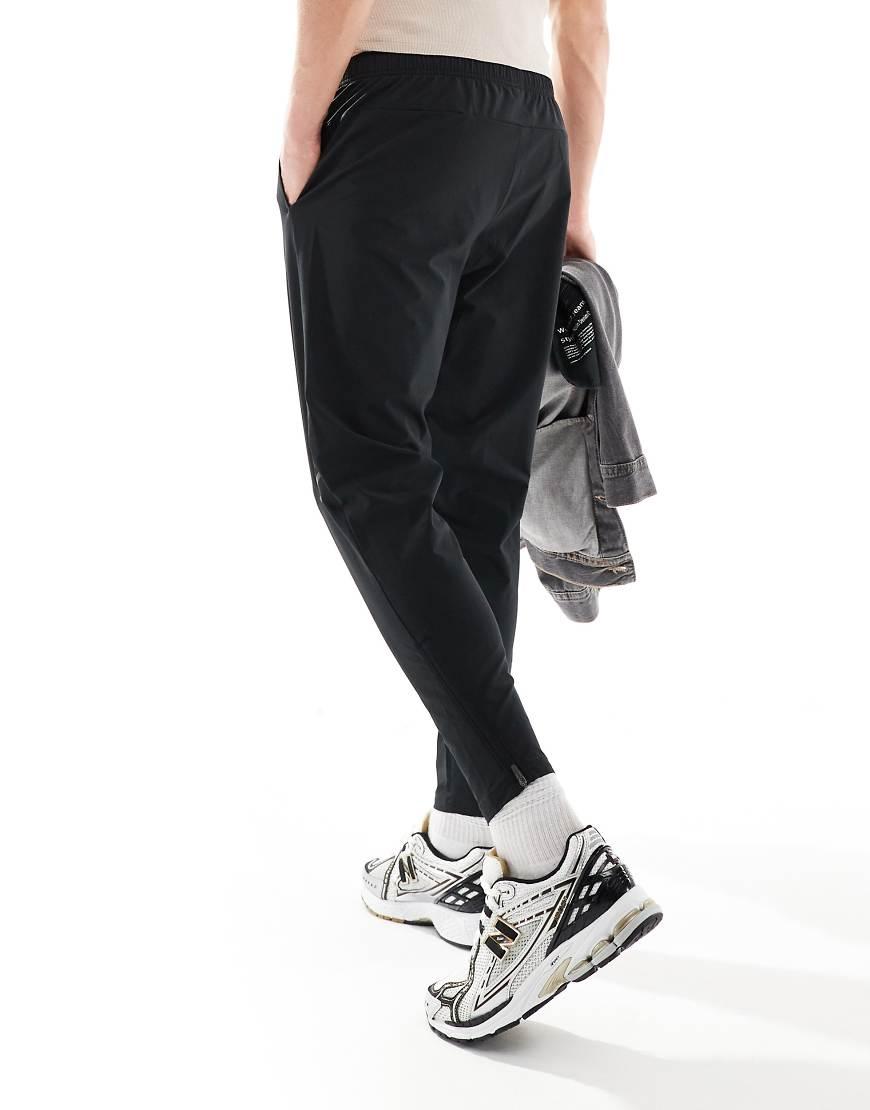 New Balance Tenacity Stretch Woven Pant in Black for Men Lyst UK