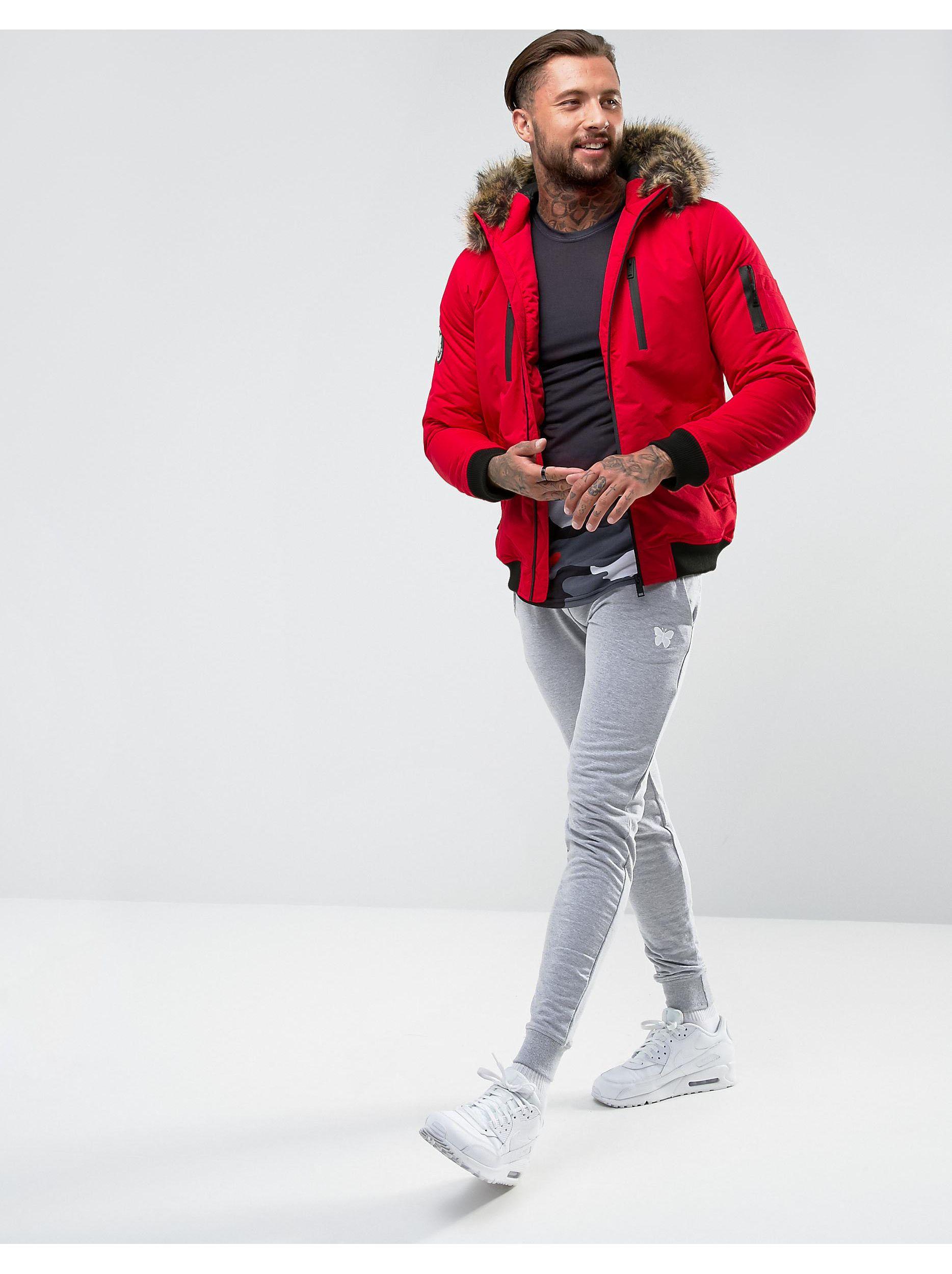 red bomber jacket with fur hood