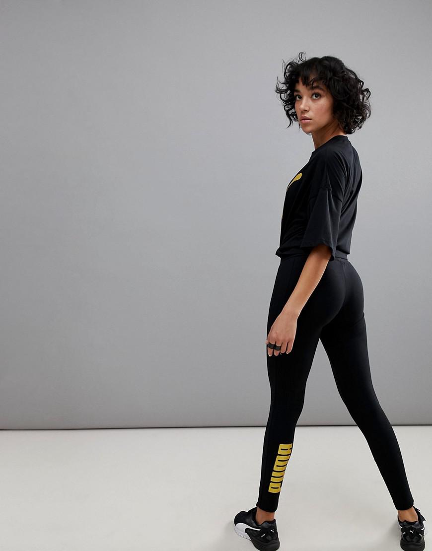 PUMA Leggings With Gold Logo in Black Lyst 