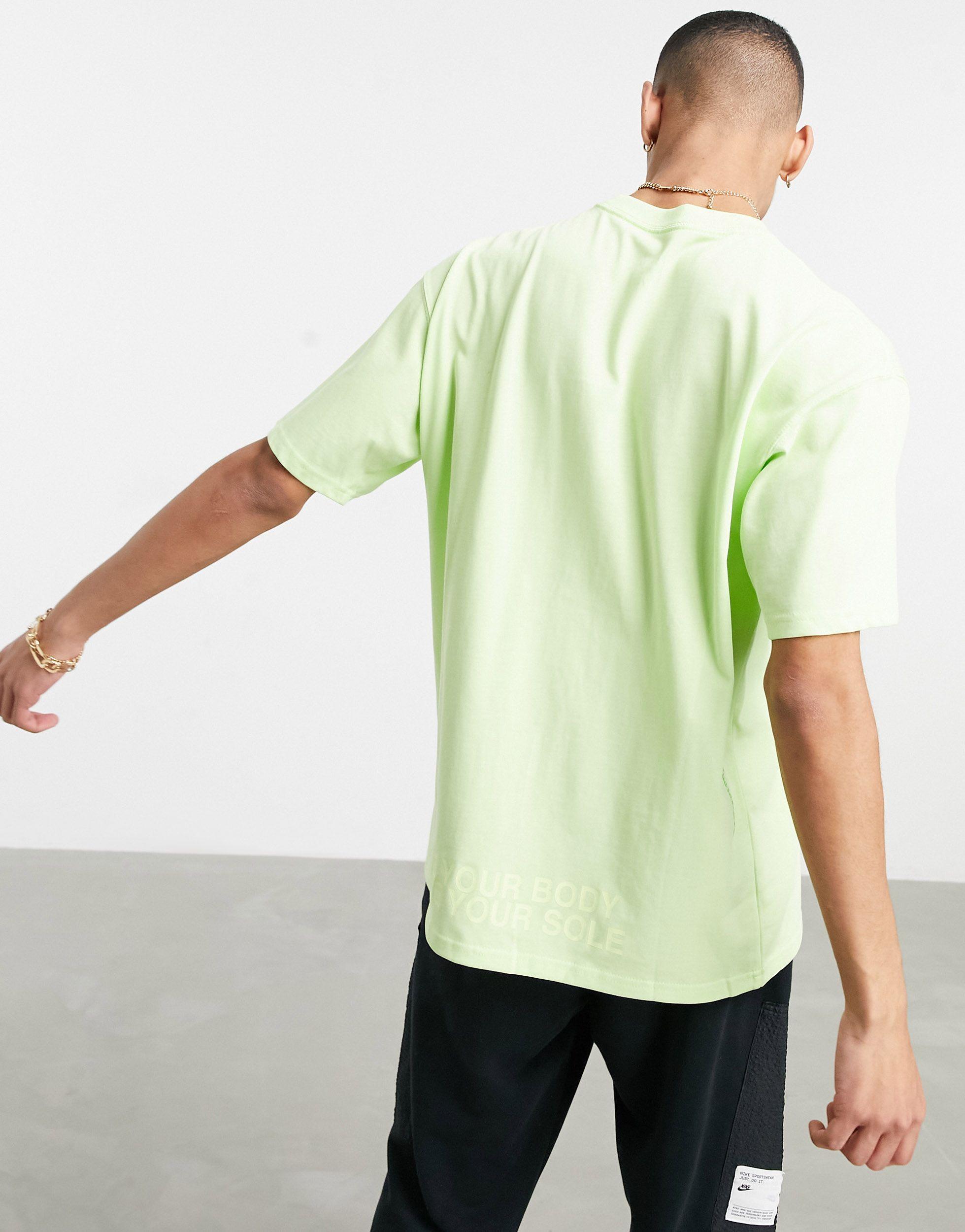 Nike World Tour Pack Graphic Oversized T-shirt in Green for Men | Lyst  Canada