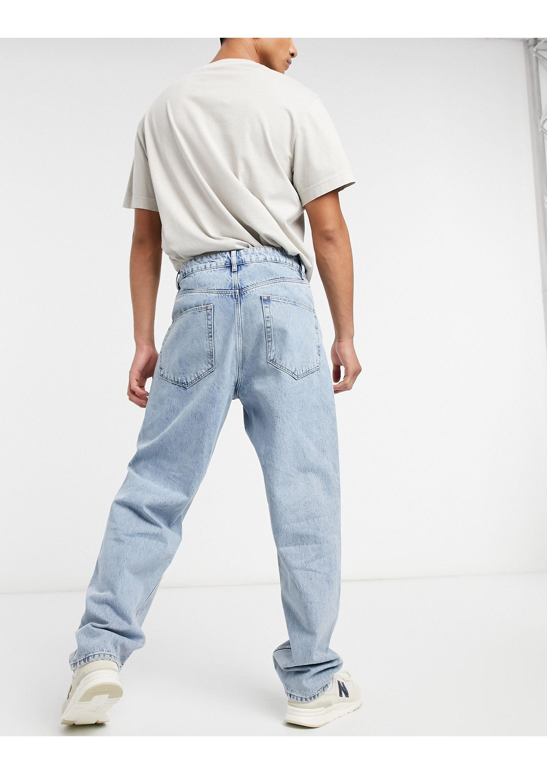 Asos Homme Vêtements Pantalons & Jeans Jeans Baggy & Large Jean baggy à délavage moyen 