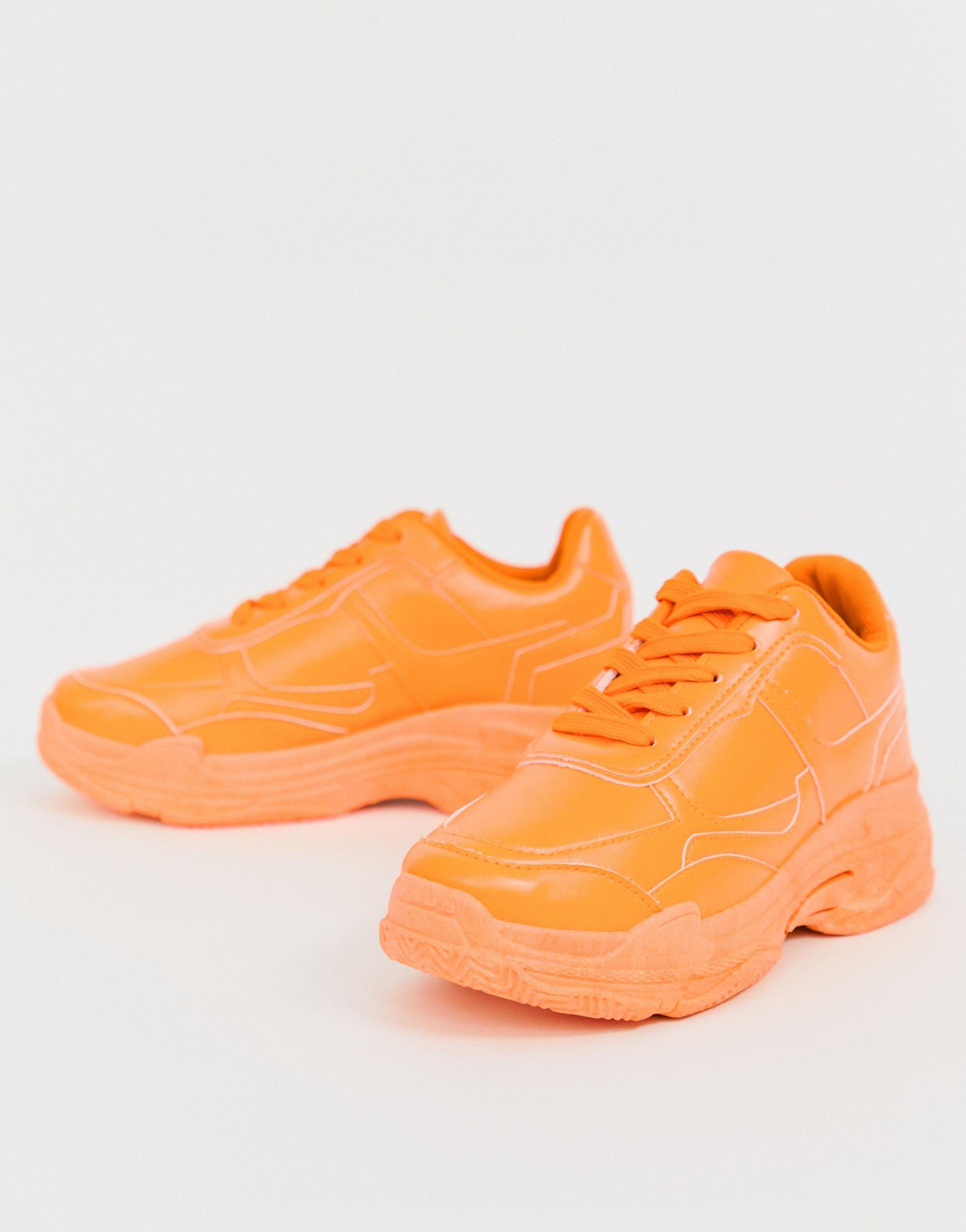 orange color sneakers