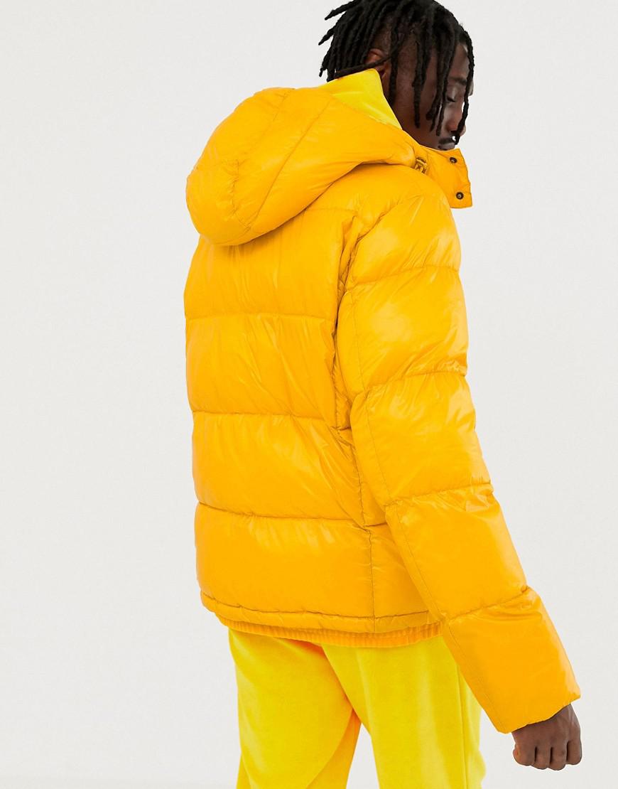 Champion Synthetic Hooded Puffer Jacket With Small Script Logo In Yellow  for Men - Lyst